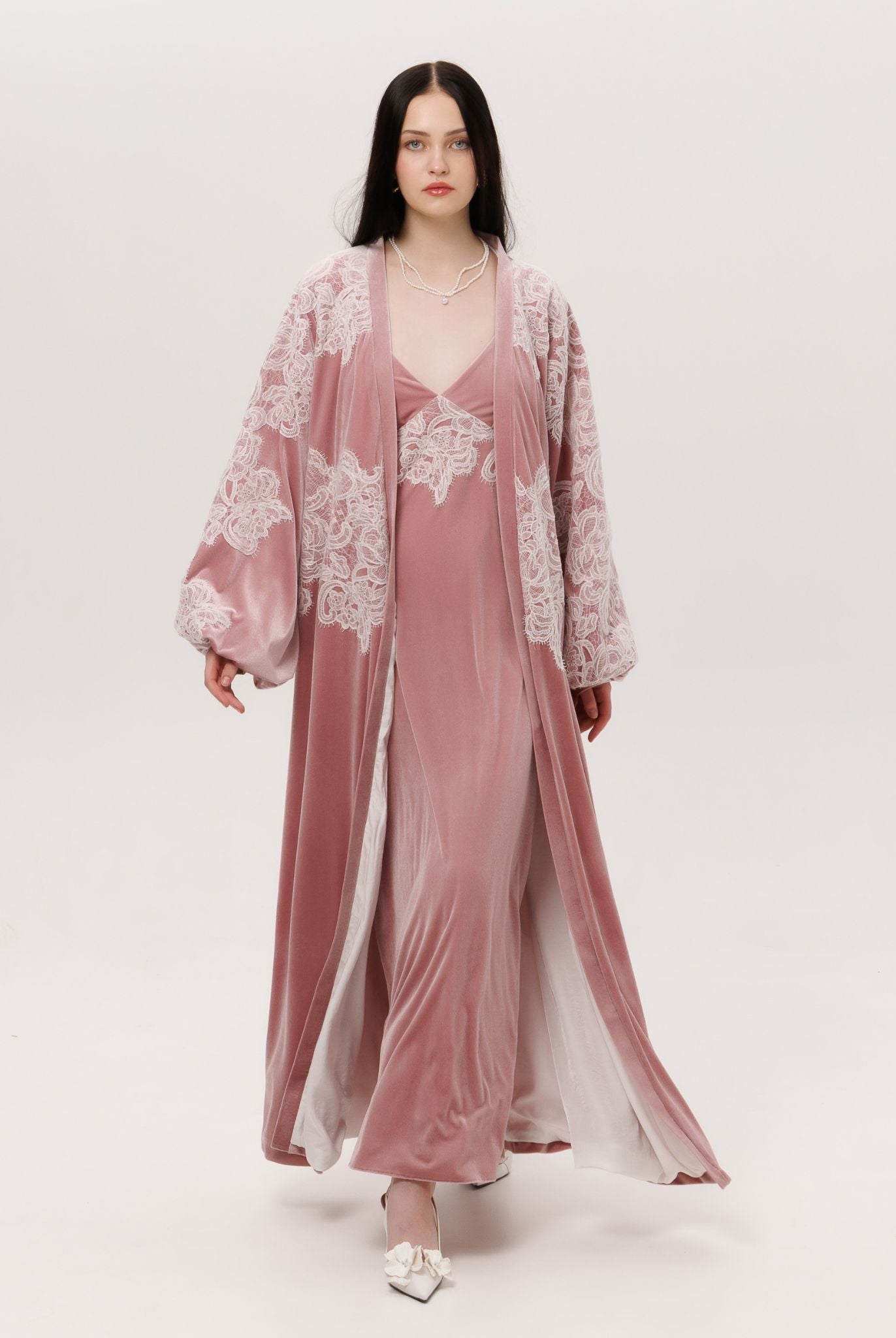 A dynamic view of the flowing silhouette, showcasing how the velvet drapes beautifully during movement.