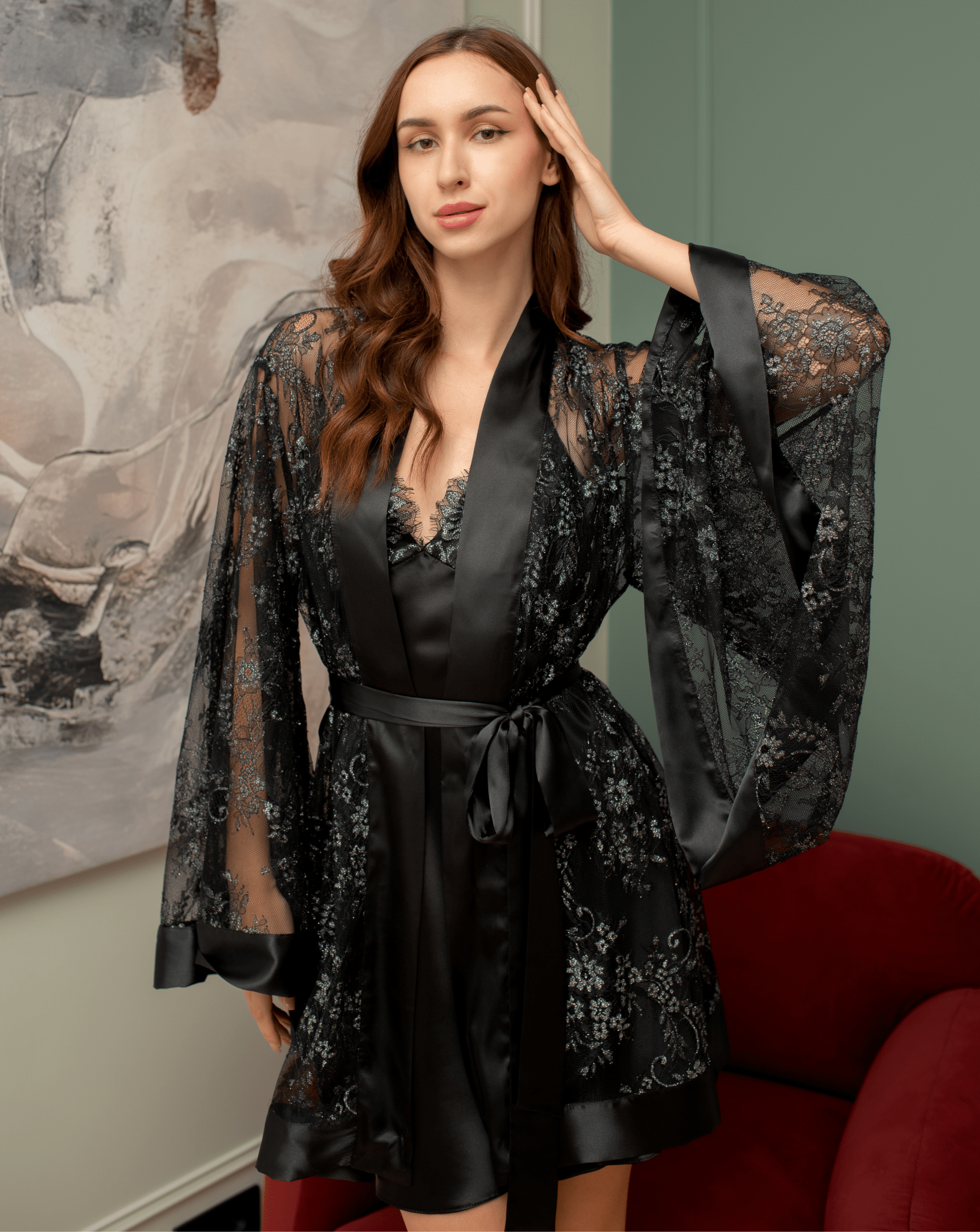 Close-up front view of sheer lace robe with flared sleeves.