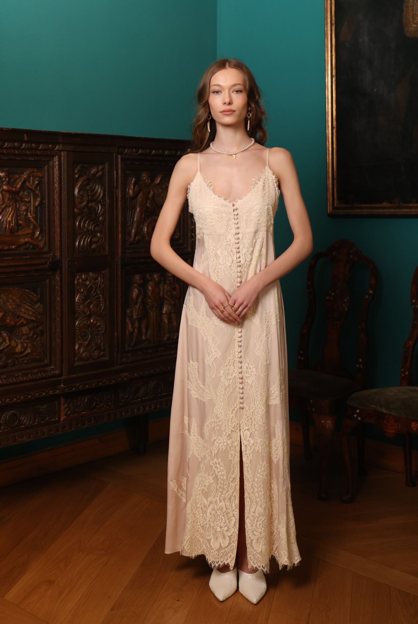 Frontal view of the nightgown featuring adjustable straps and a design that allows for gentle nursing access.