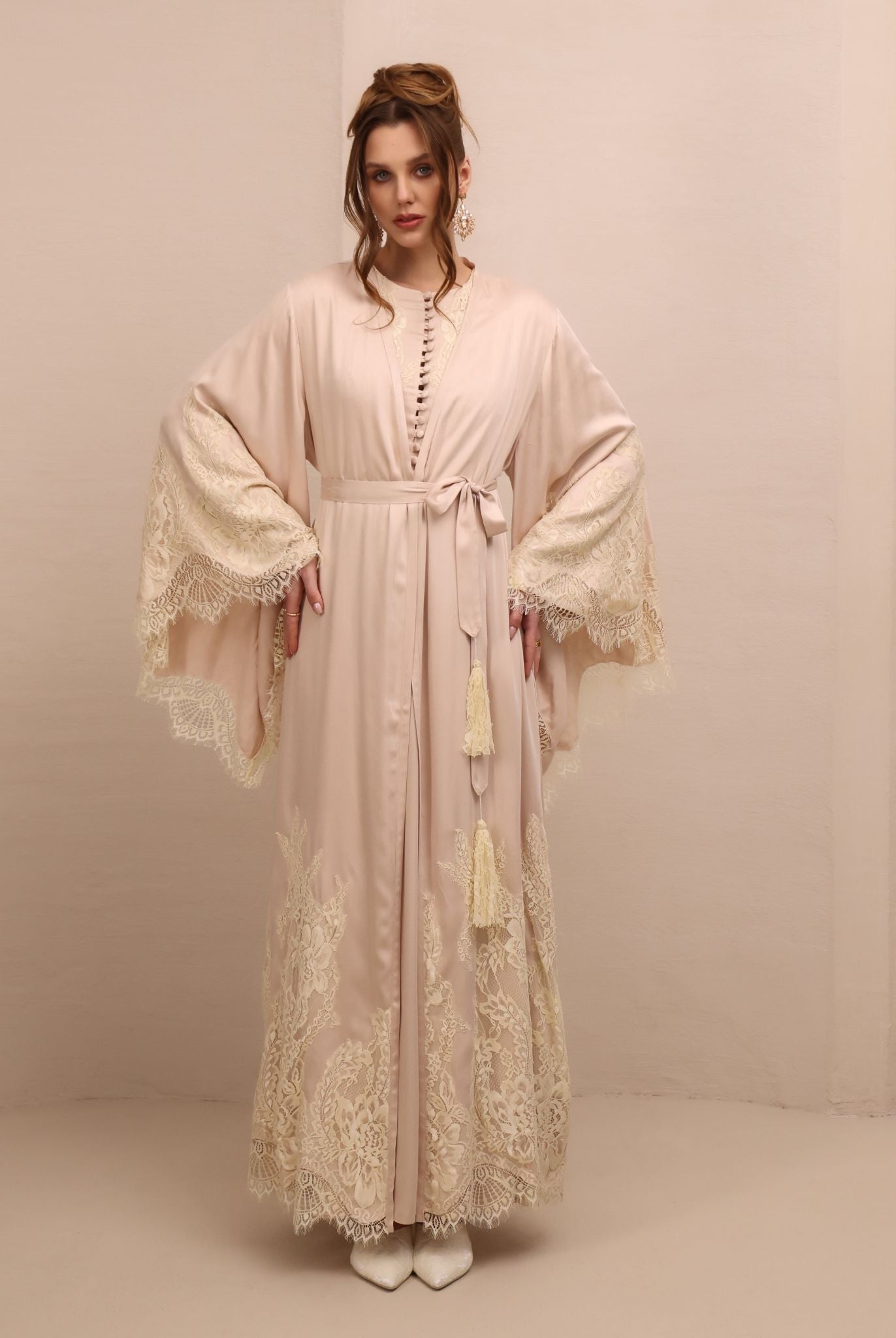 A poised frontal shot of the tied attire, illustrating a modest look and the gentle feel of light viscose.