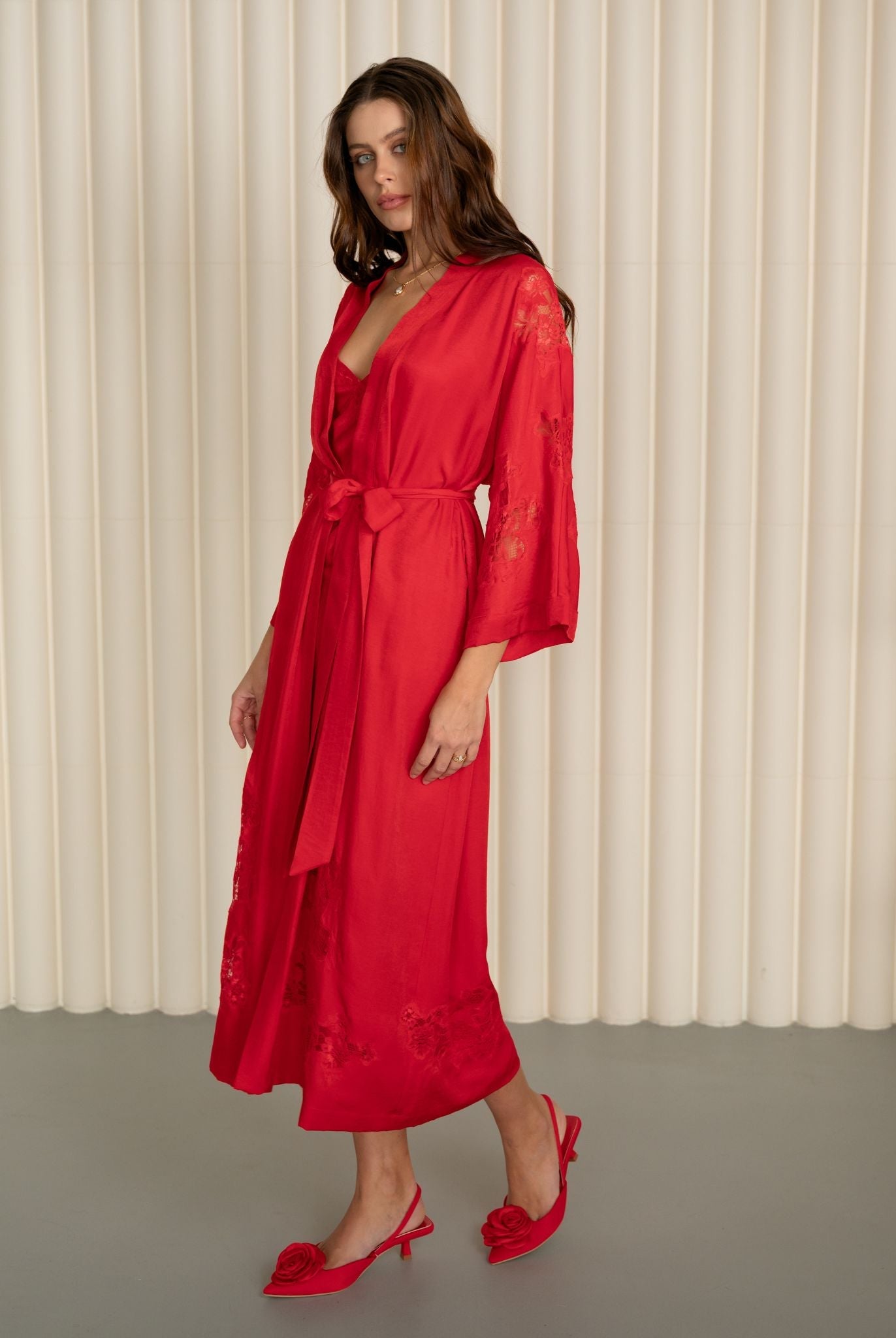 lowing Robe and Nightgown Set captured in motion, featuring the wrap-over style and ankle-length design.
