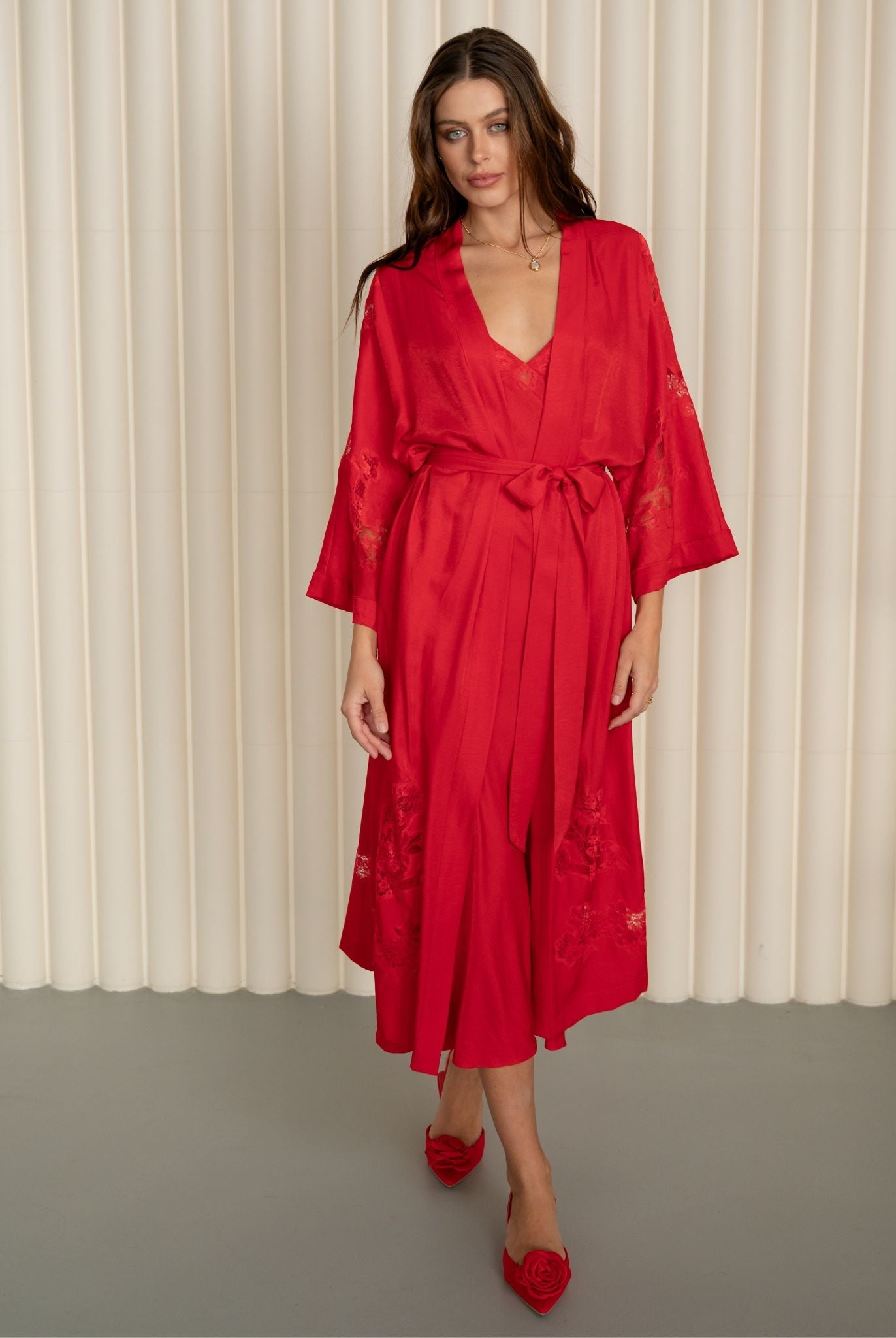 Dynamic shot of the belted viscose ensemble, showcasing the sophisticated style and soft comfort during movement.