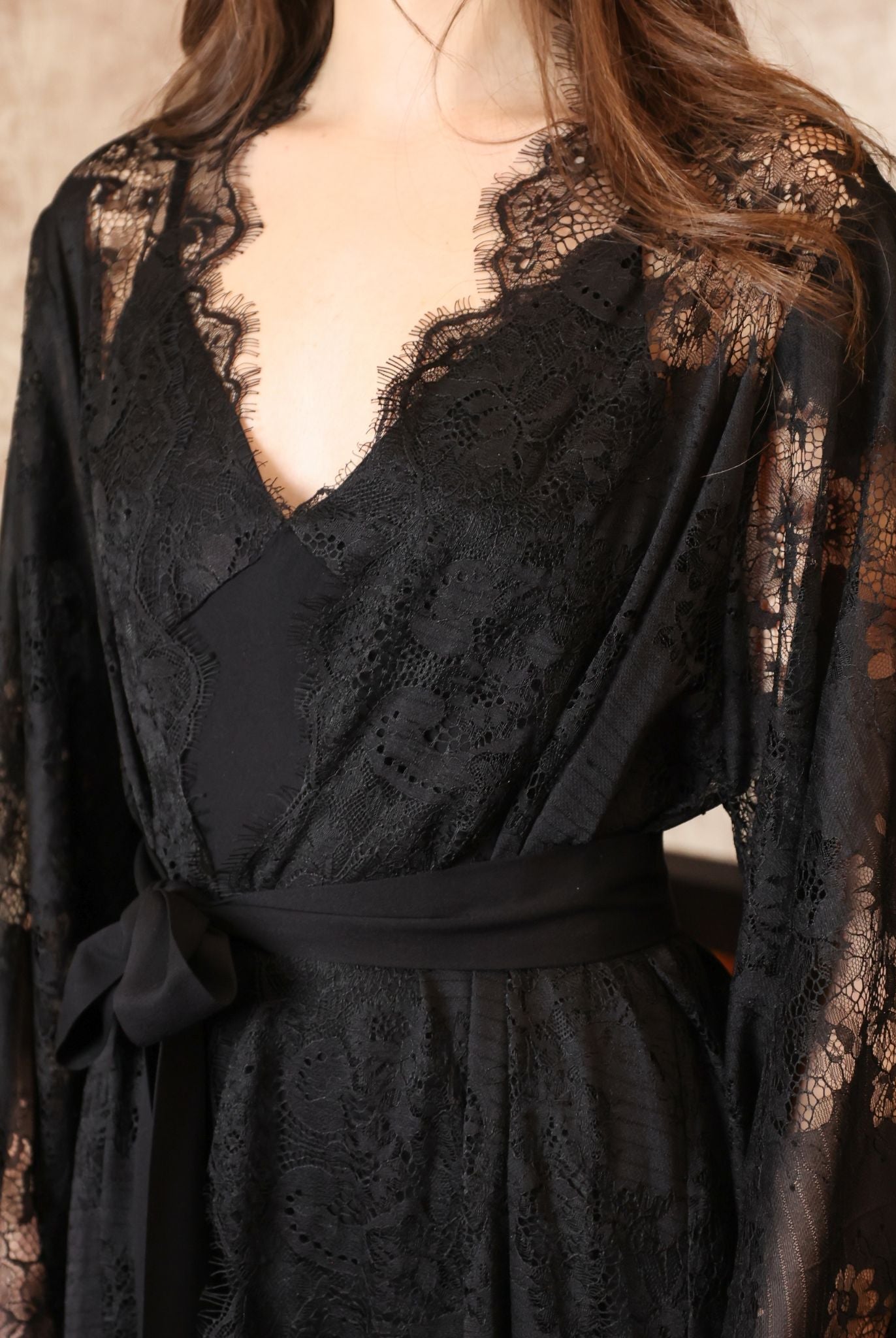 Close-up from neck to waist of the Robe and Nightgown Set, focusing on the soft structured drape and tied sash.