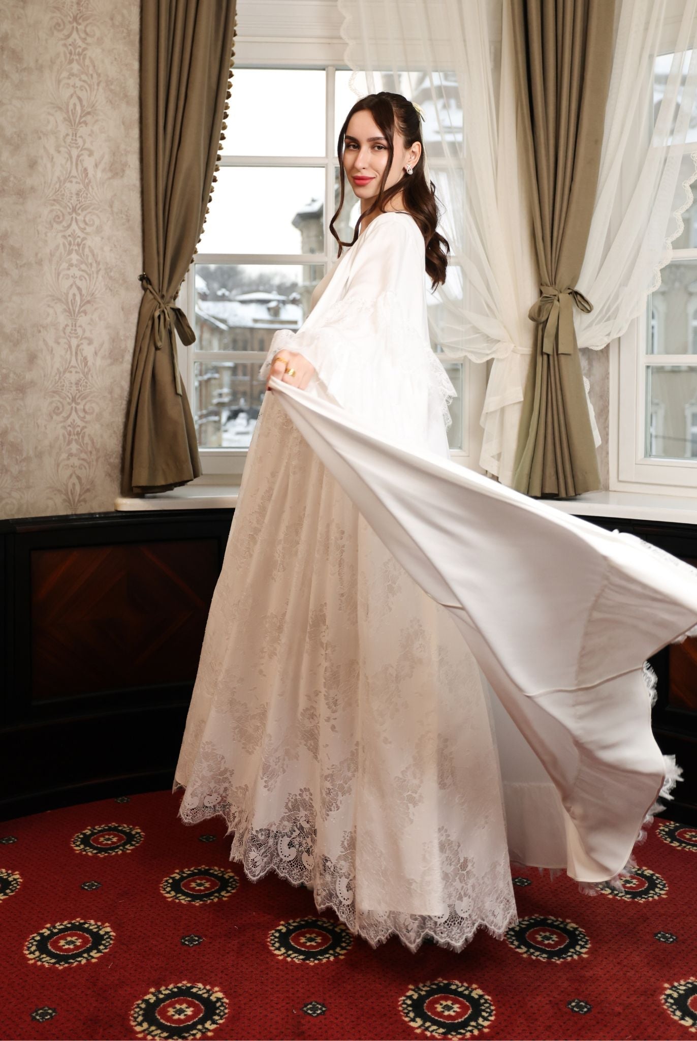 A dynamic "flying" shot of the Cotton Robe and Nightgown Set, capturing the movement of the tiered bell sleeves.