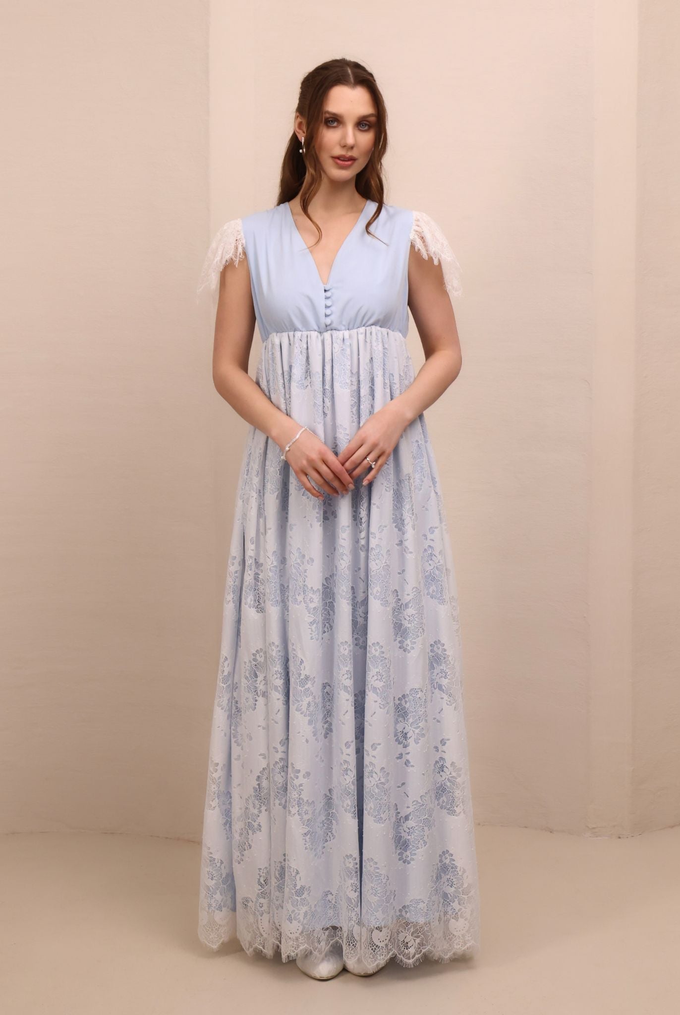 Frontal view of the nightgown featuring lace-trimmed shoulders and buttons for discreet breastfeeding access.