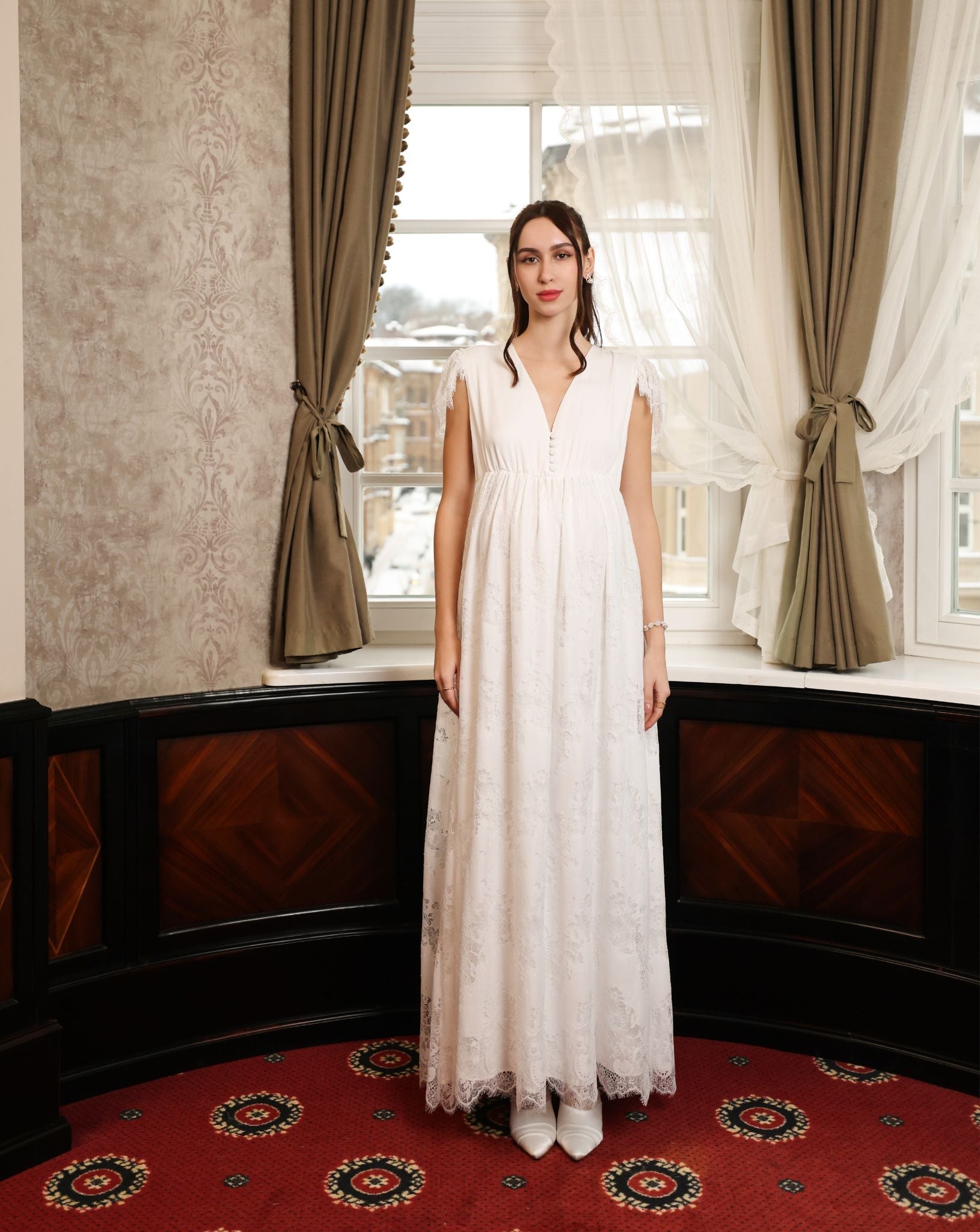 Frontal view of the A-line nightgown, featuring lace-trimmed shoulders and gathered waist for a breathable fit.