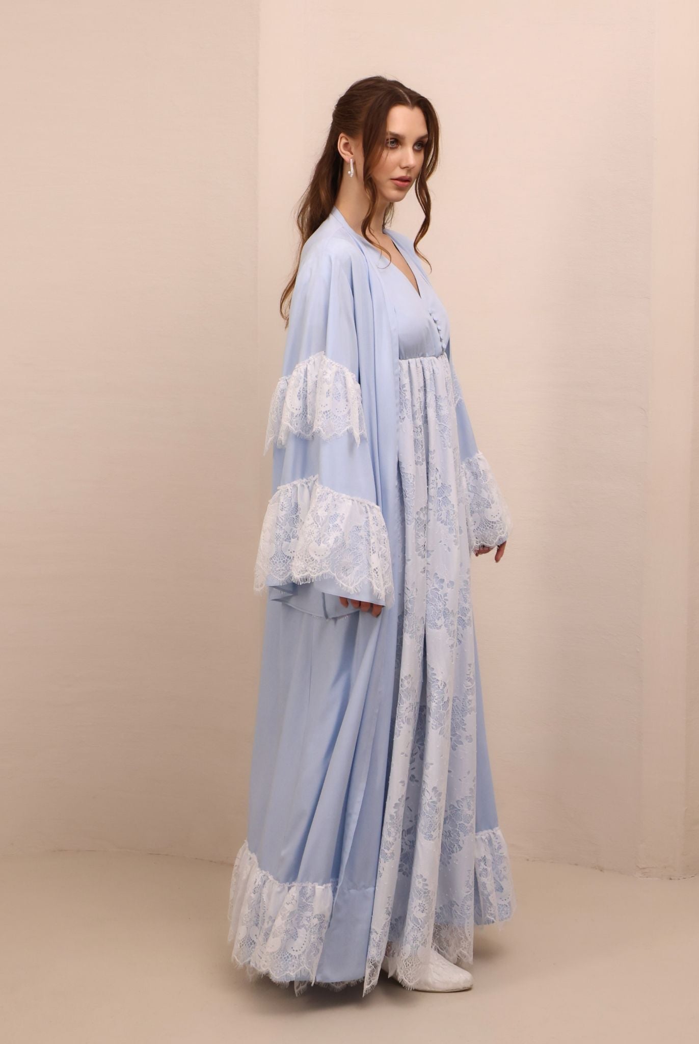 Side perspective of the attire, highlighting the effortless A-line silhouette and the soft, gathered waist.