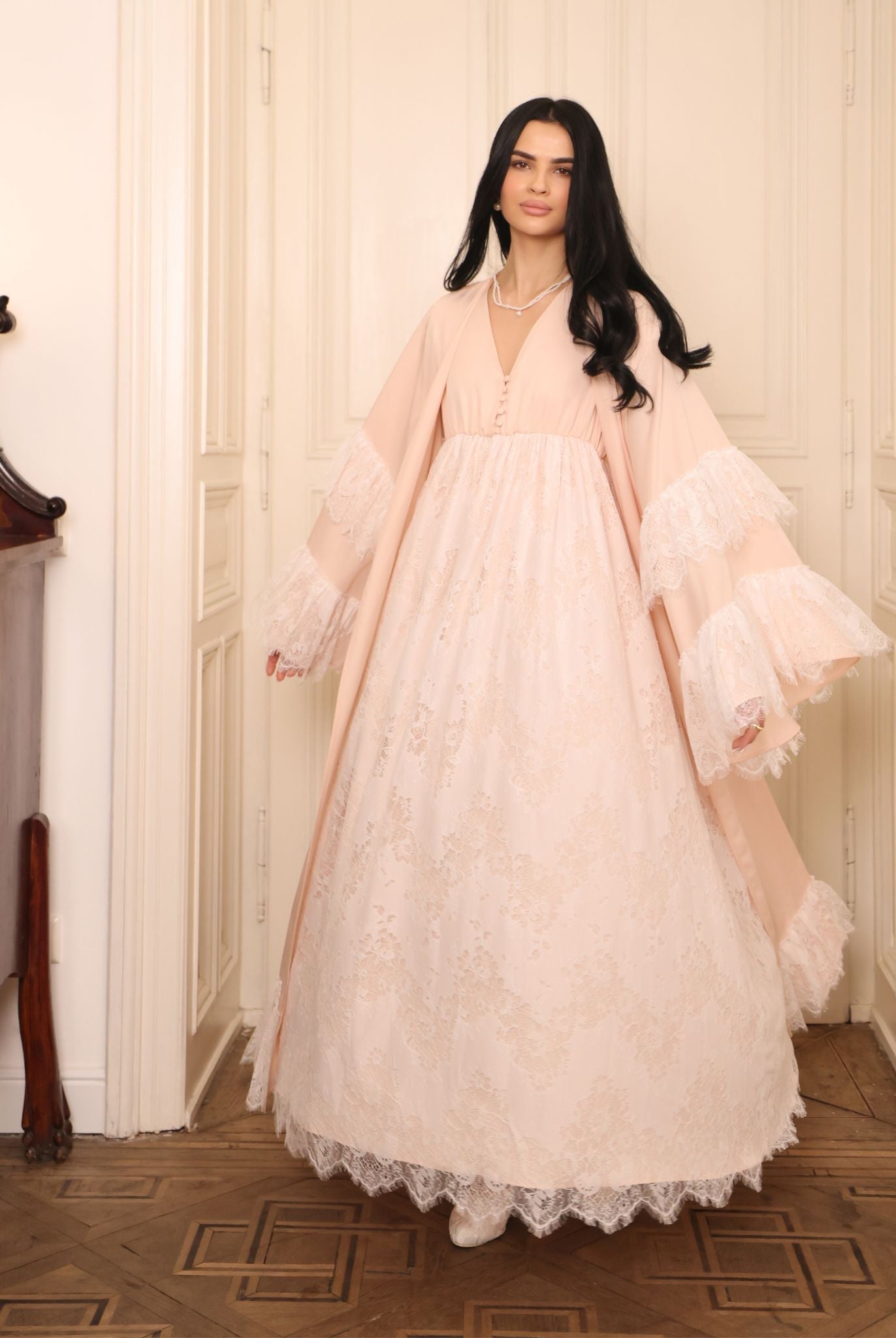 A full-length shot of the Cotton Robe and Nightgown Set during a turn, showcasing the flowing lace-trimmed hem.