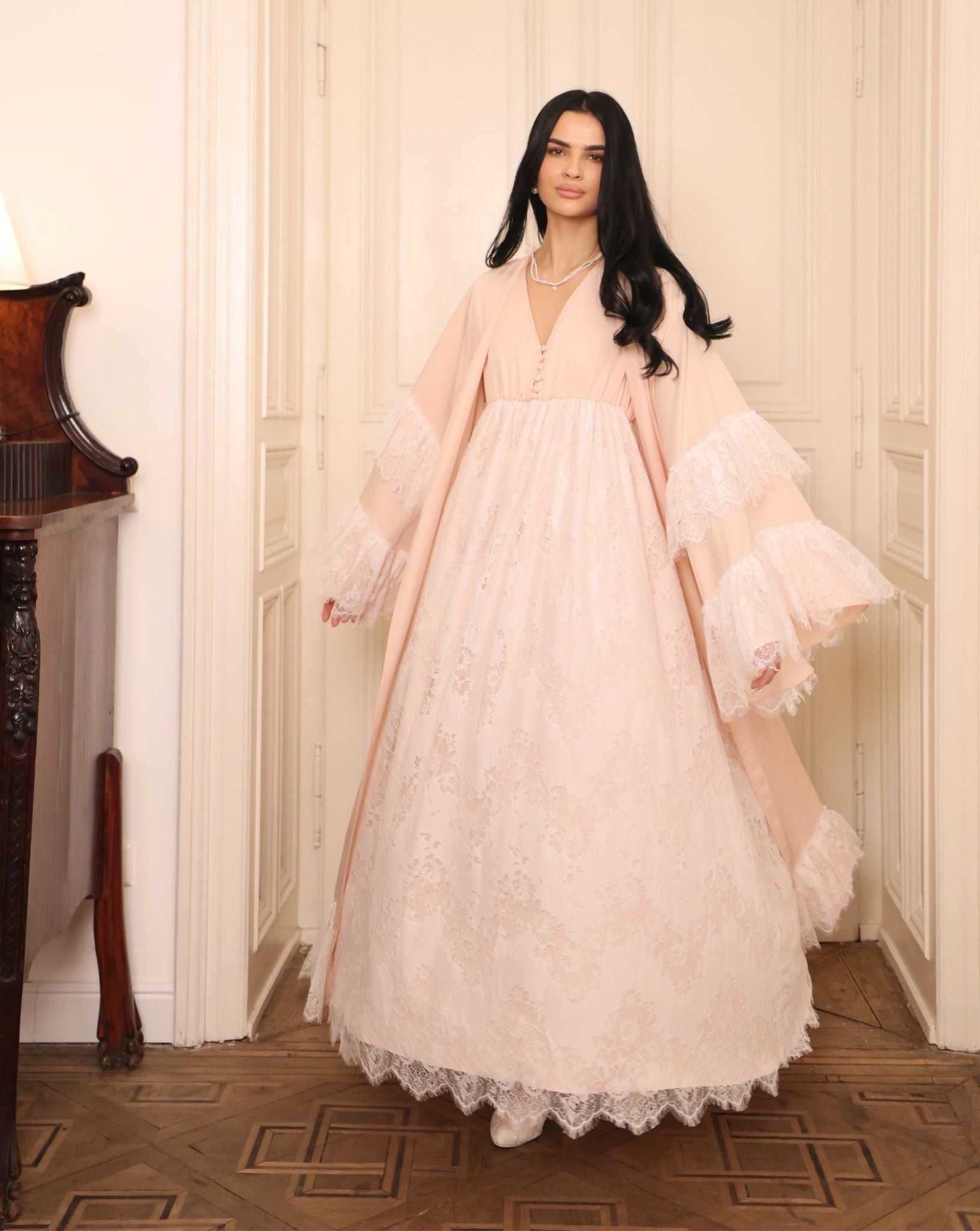 A full-length shot of the Cotton Robe and Nightgown Set during a turn, showcasing the flowing lace-trimmed hem.