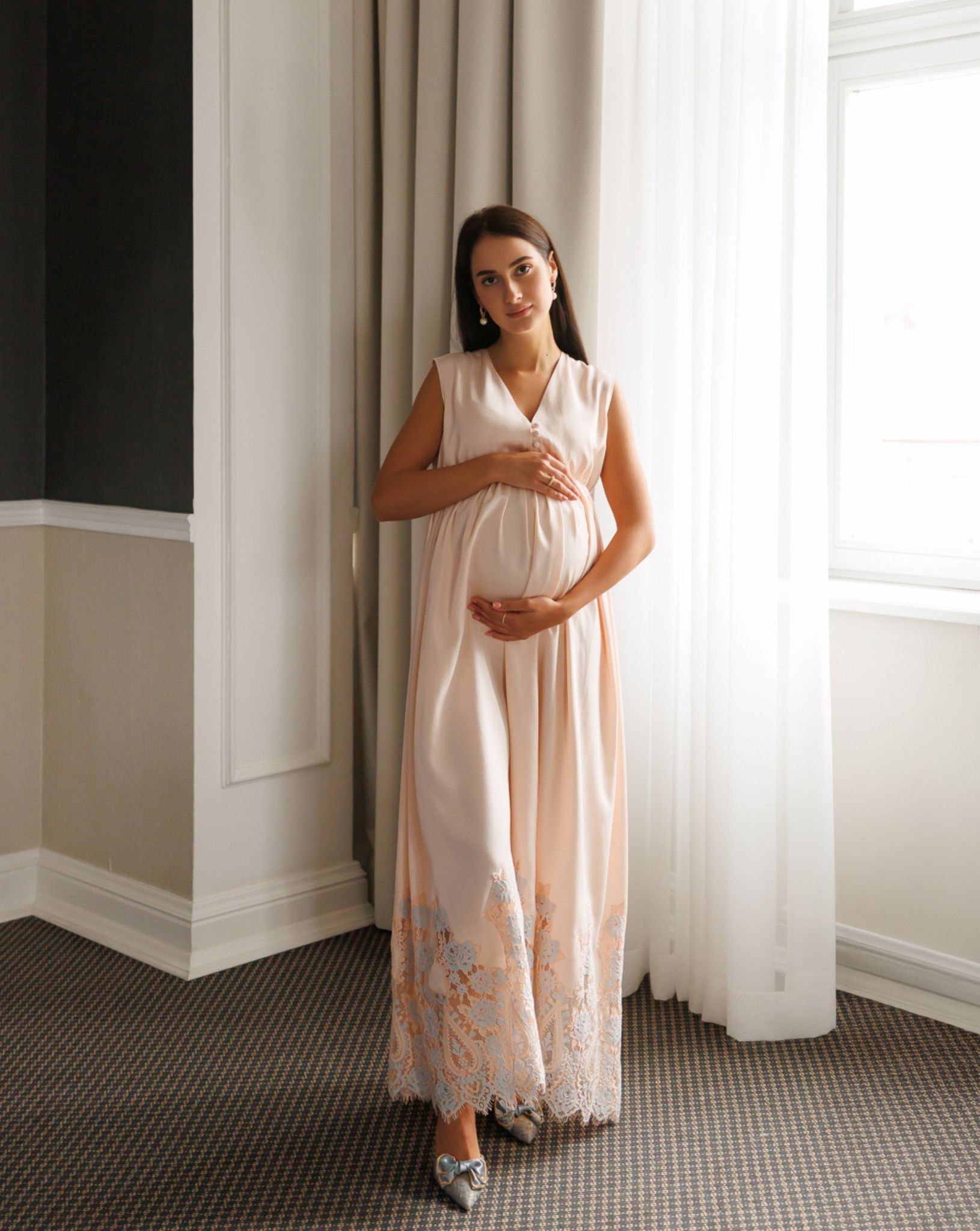 Frontal view of a cotton nightgown with an elastic under the bust, designed for maximum comfort and a flattering shape.