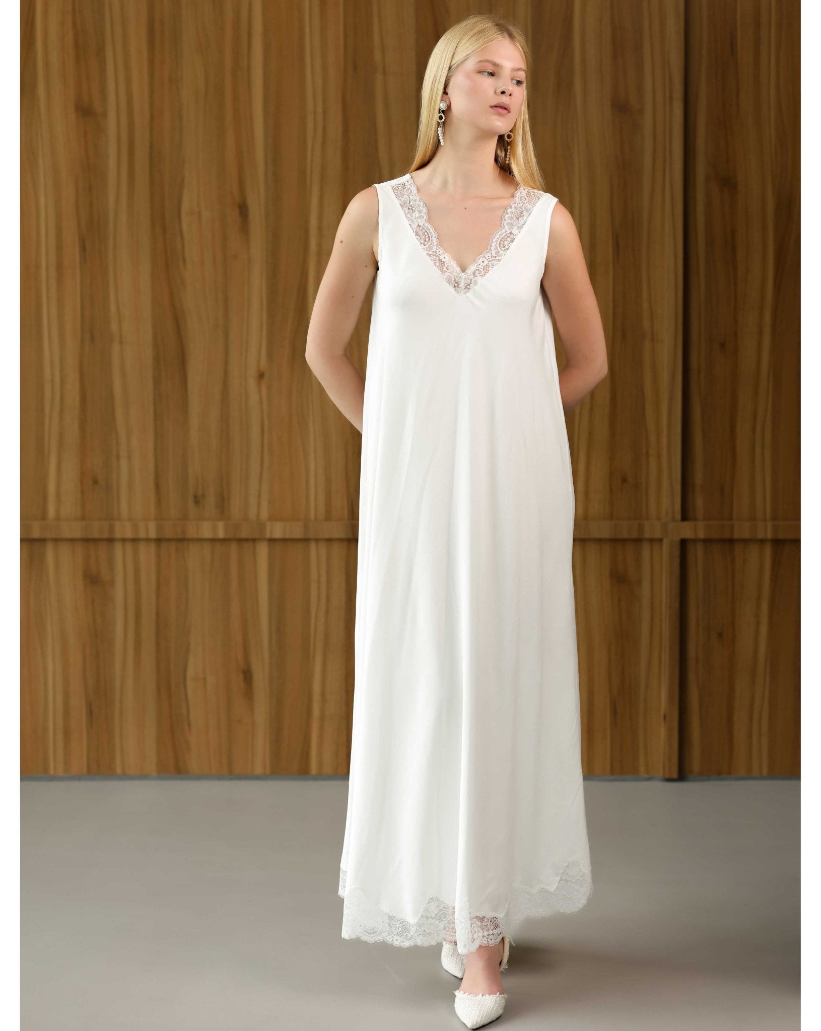 Front view of a white Robe and Nightgown Set nightdress, featuring a loose fit and delicate lace-trimmed neckline.