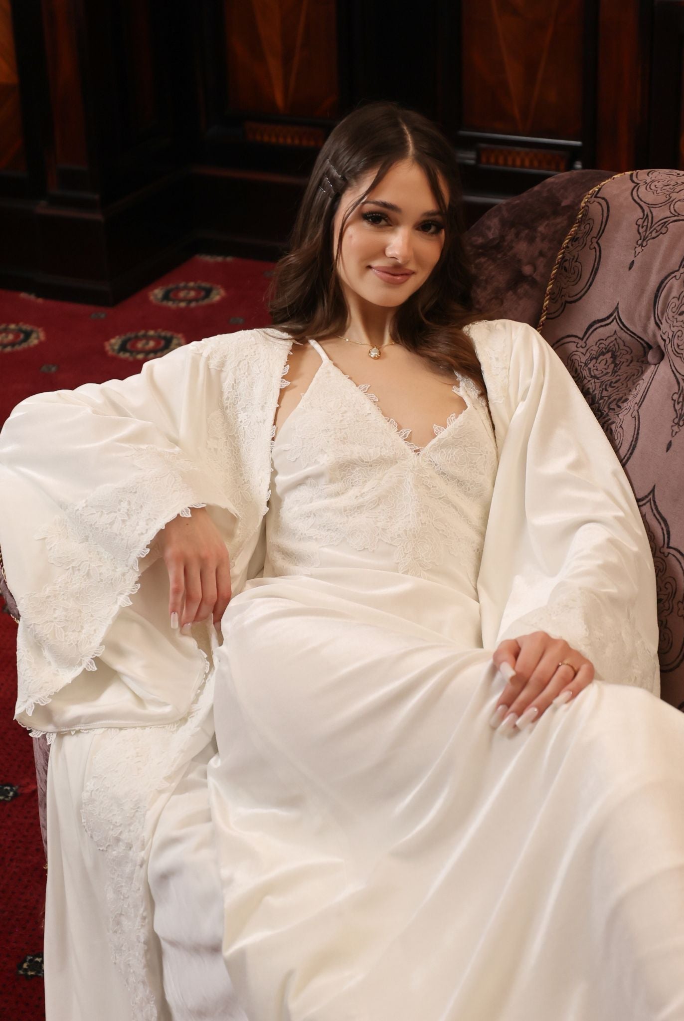 An atmospheric shot showing the velvet ensemble, designed for warmth and sensual moments during cold months.