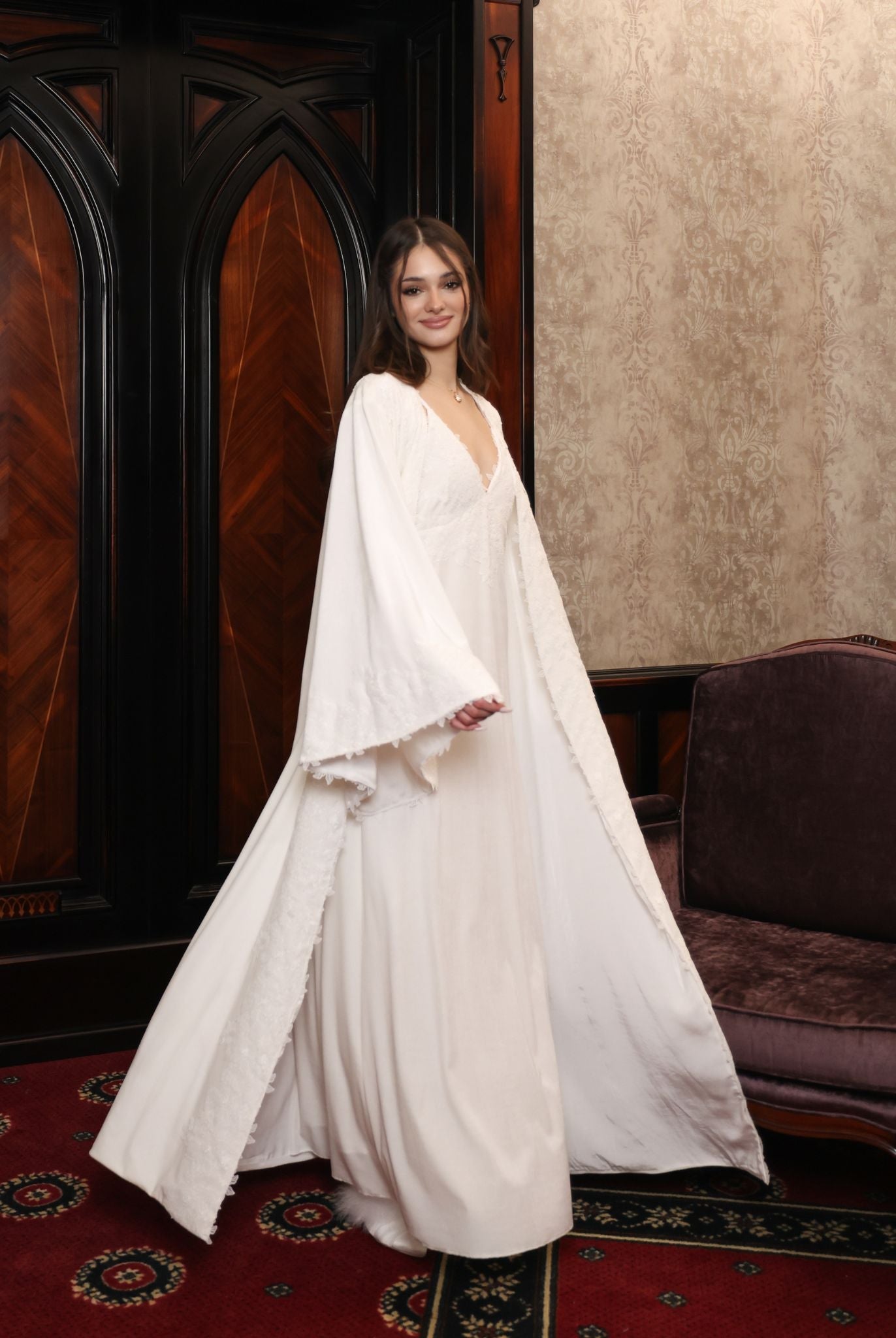 A dynamic shot of the Velvet Robe in motion, illustrating the visual poetry of the flowing silhouette.