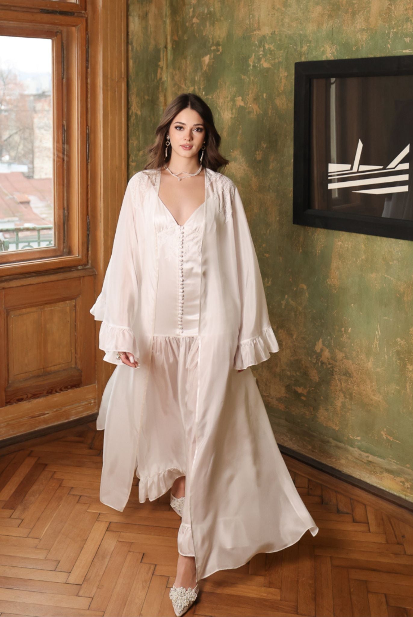 Dynamic frontal shot of the complete silk set in motion, emphasizing the light and breezy nature of the fabric.