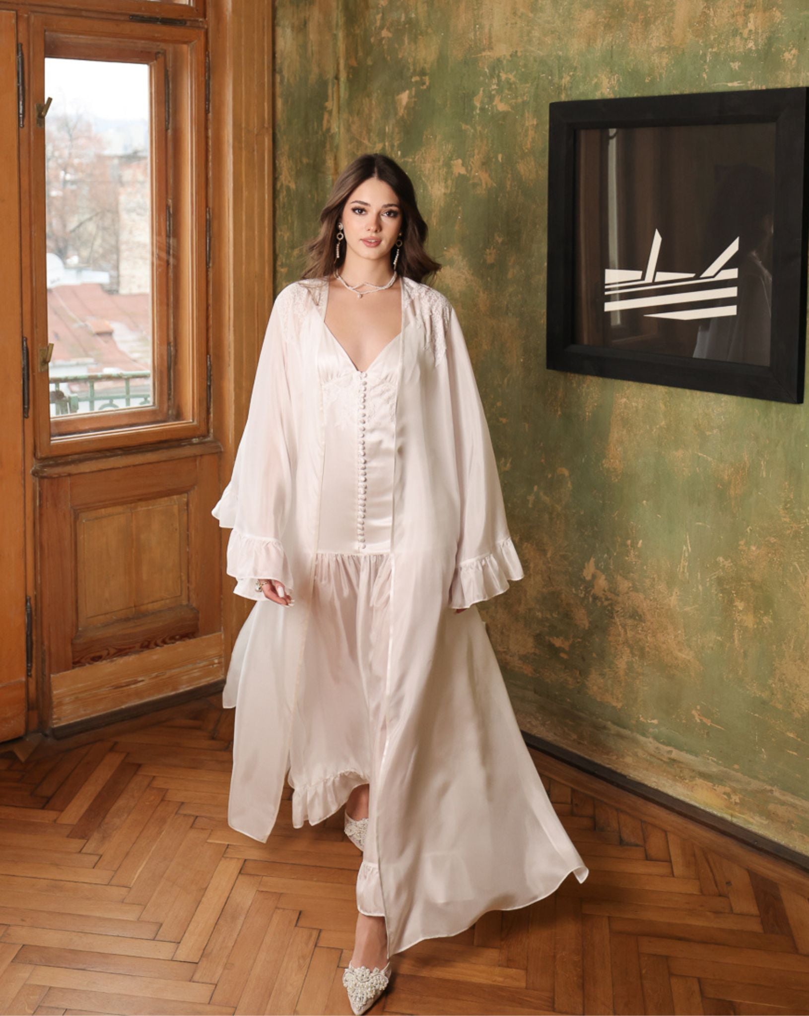 Dynamic frontal shot of the complete silk set in motion, emphasizing the light and breezy nature of the fabric.