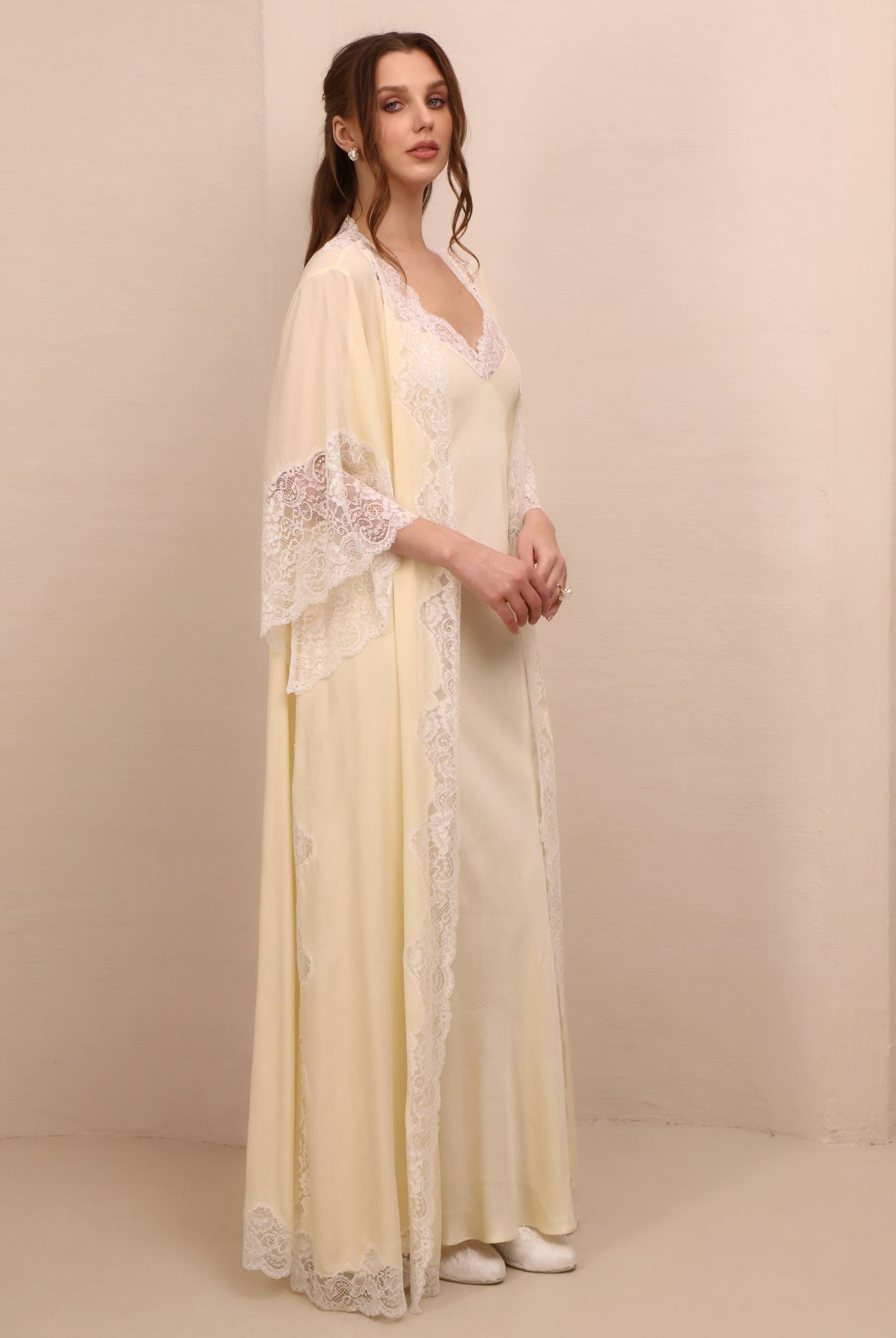 Side perspective of the ensemble, illustrating the elegant drape and the sophisticated allure of the lace-edged robe.