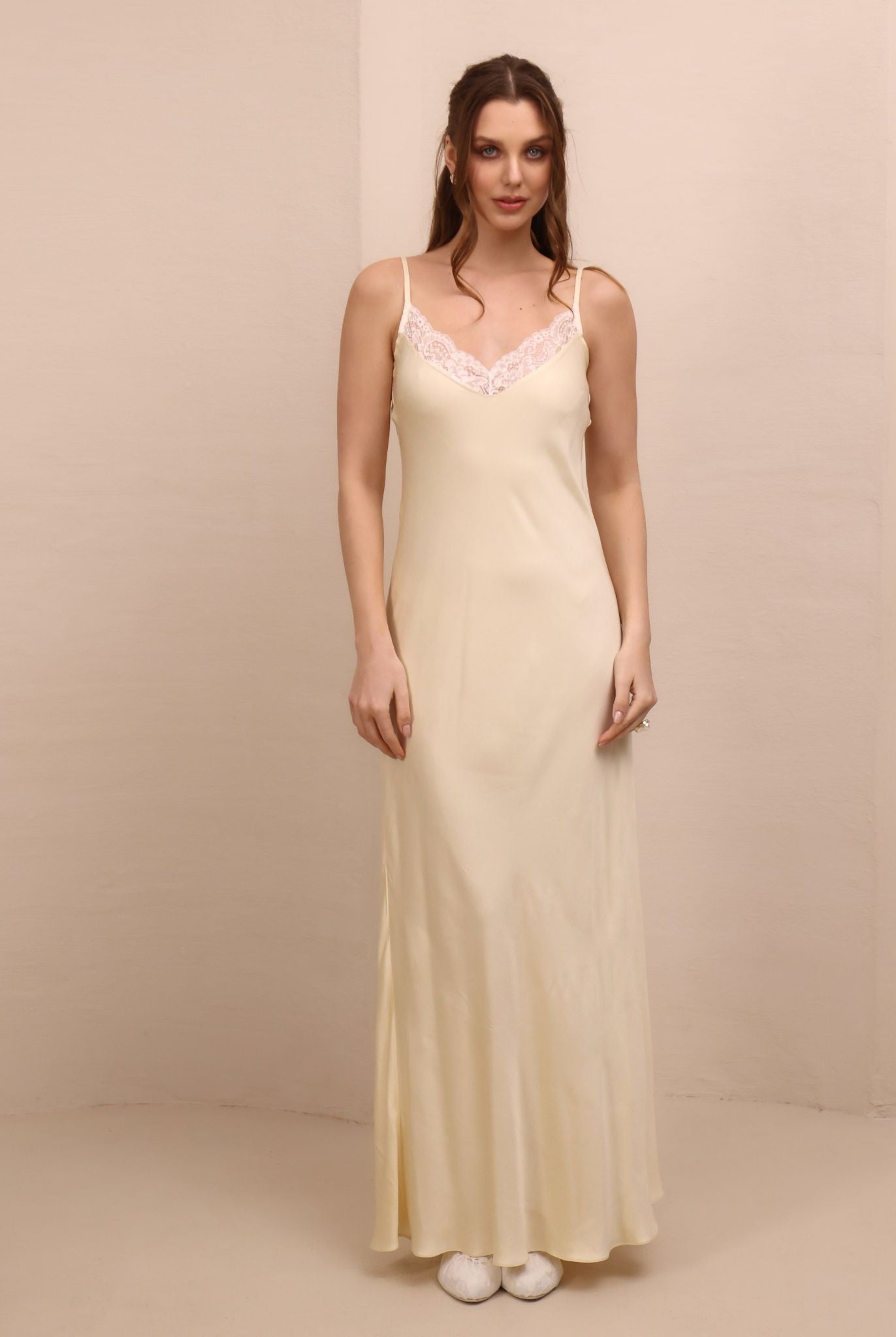 Frontal shot of the delicate nightgown, showcasing the refined texture and movement designed for bridal preparations.