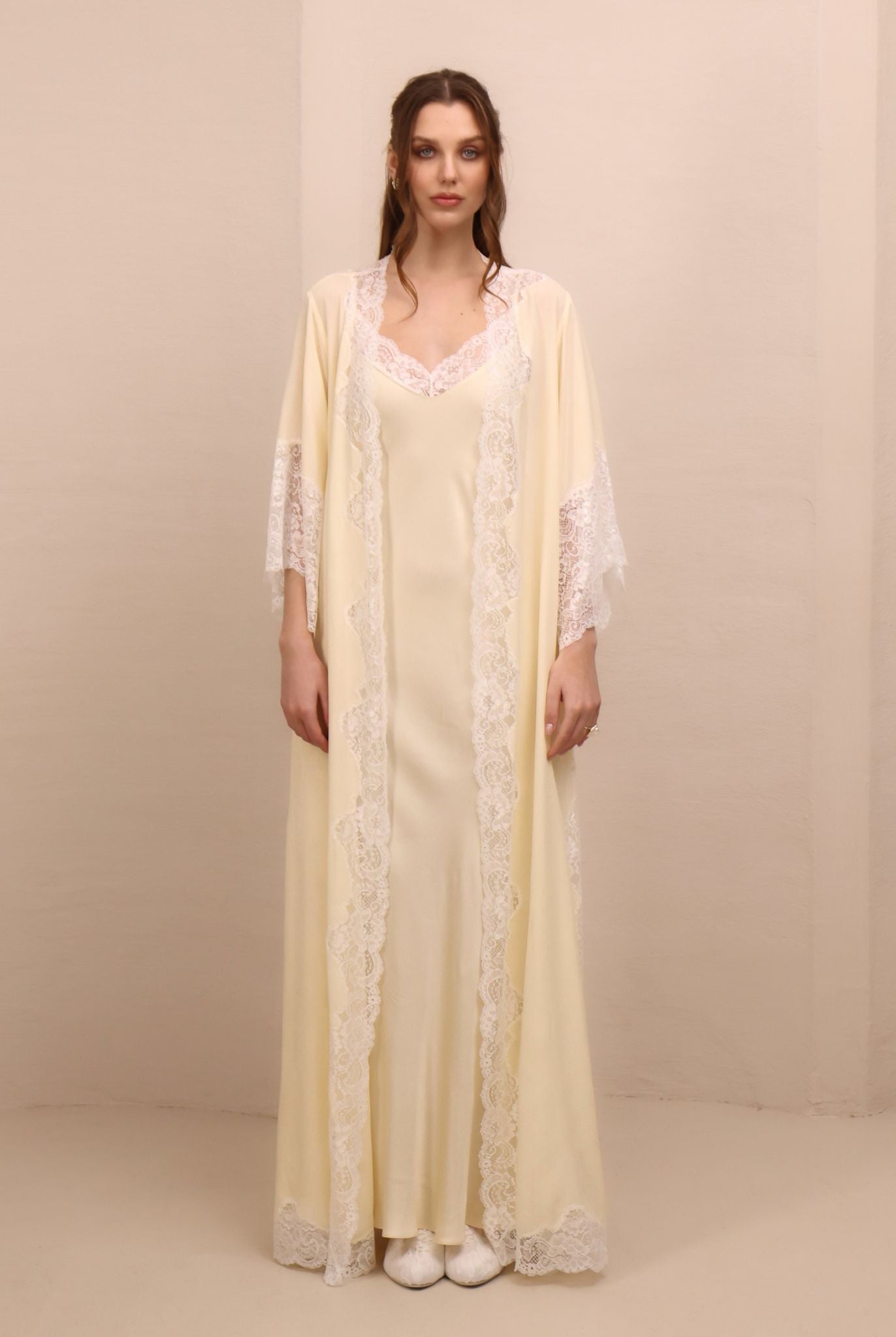 A serene static view of the Robe and Nightgown Set, celebrating femininity with a romantic harmony of textures.