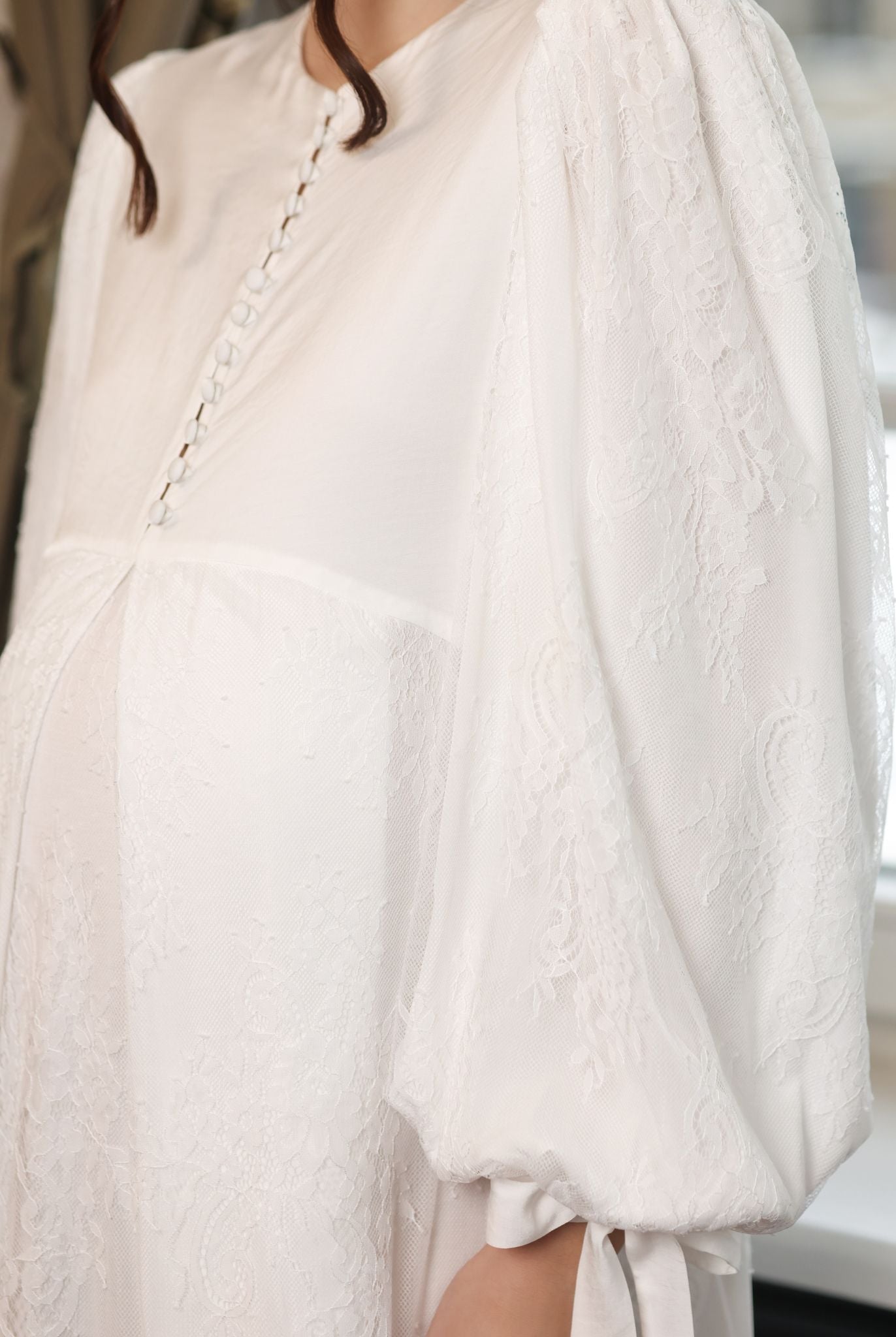 Mid-length shot of the Modest Lounge Dress, highlighting how the wide sleeves add grace to every movement.