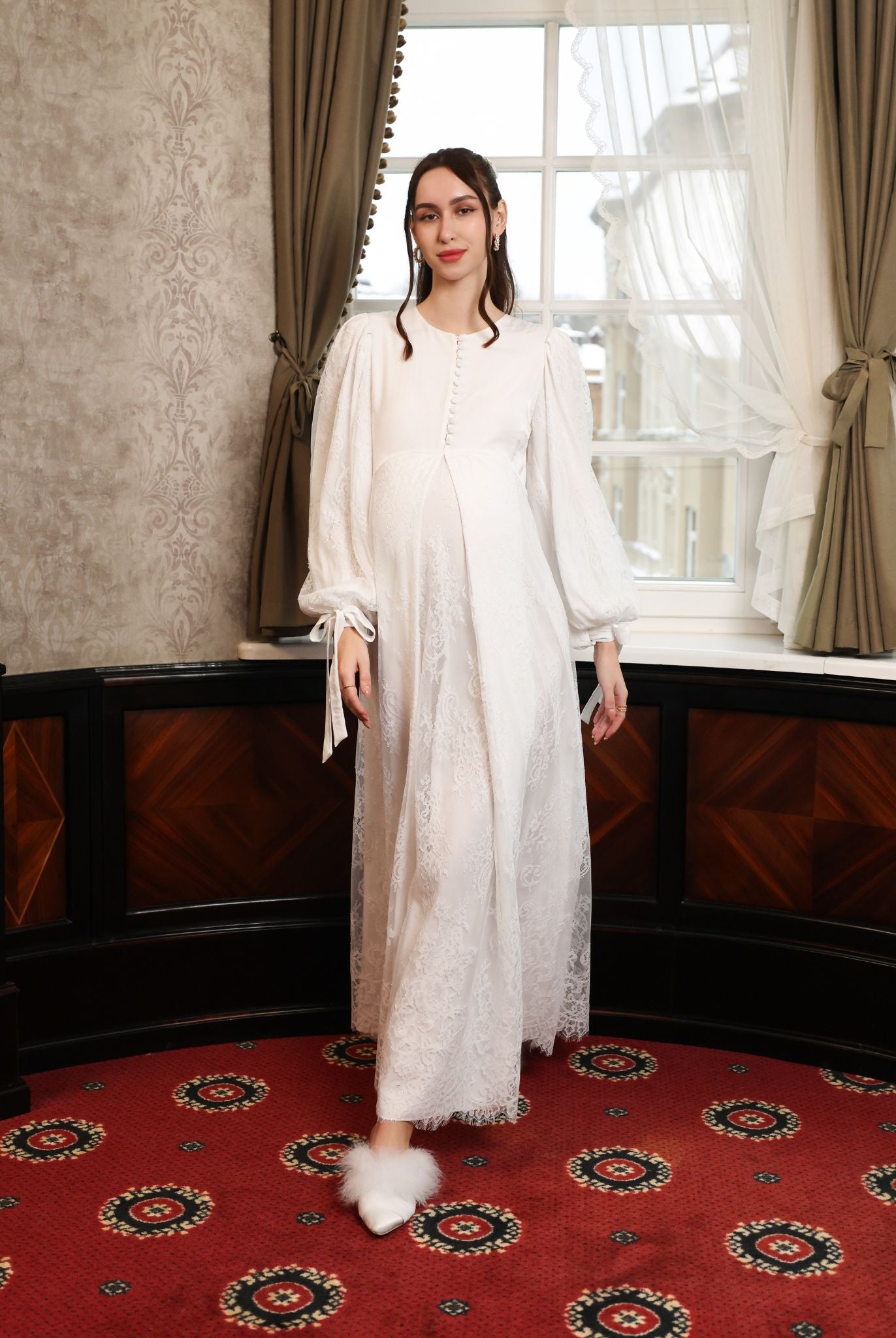 A full-length shot of the Modest Lounge Dress in motion, illustrating the grace of the layered lace skirt.