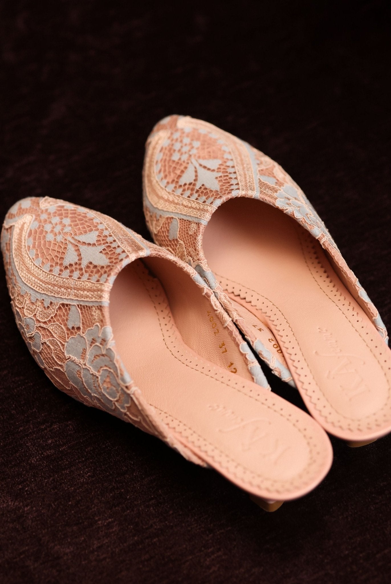 A clear view of the lace-adorned footwear, highlighting the soft padded insole and the quality of genuine leather.