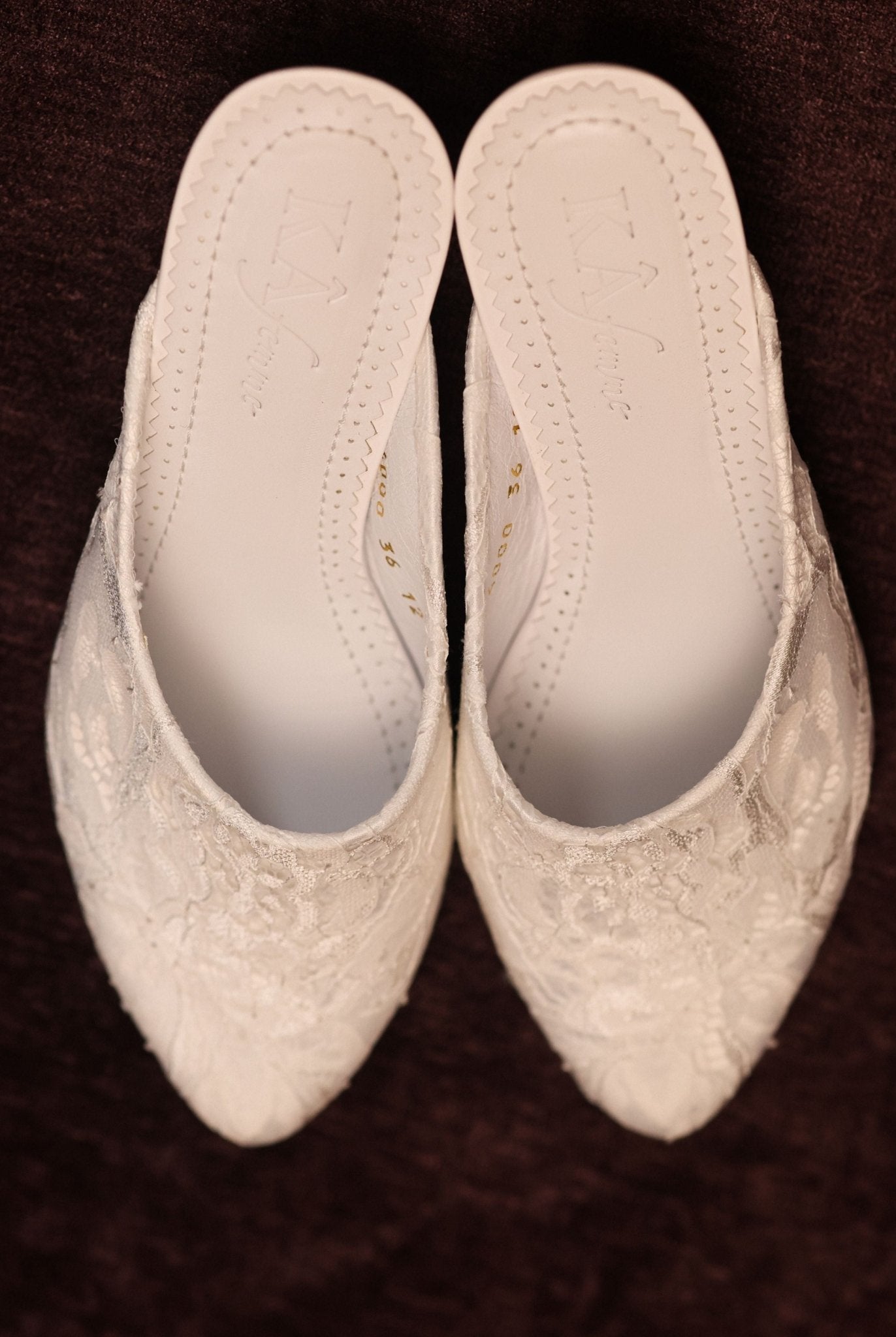 A clear view of the lace-adorned footwear, showcasing its structure, delicate materials, and graceful design.