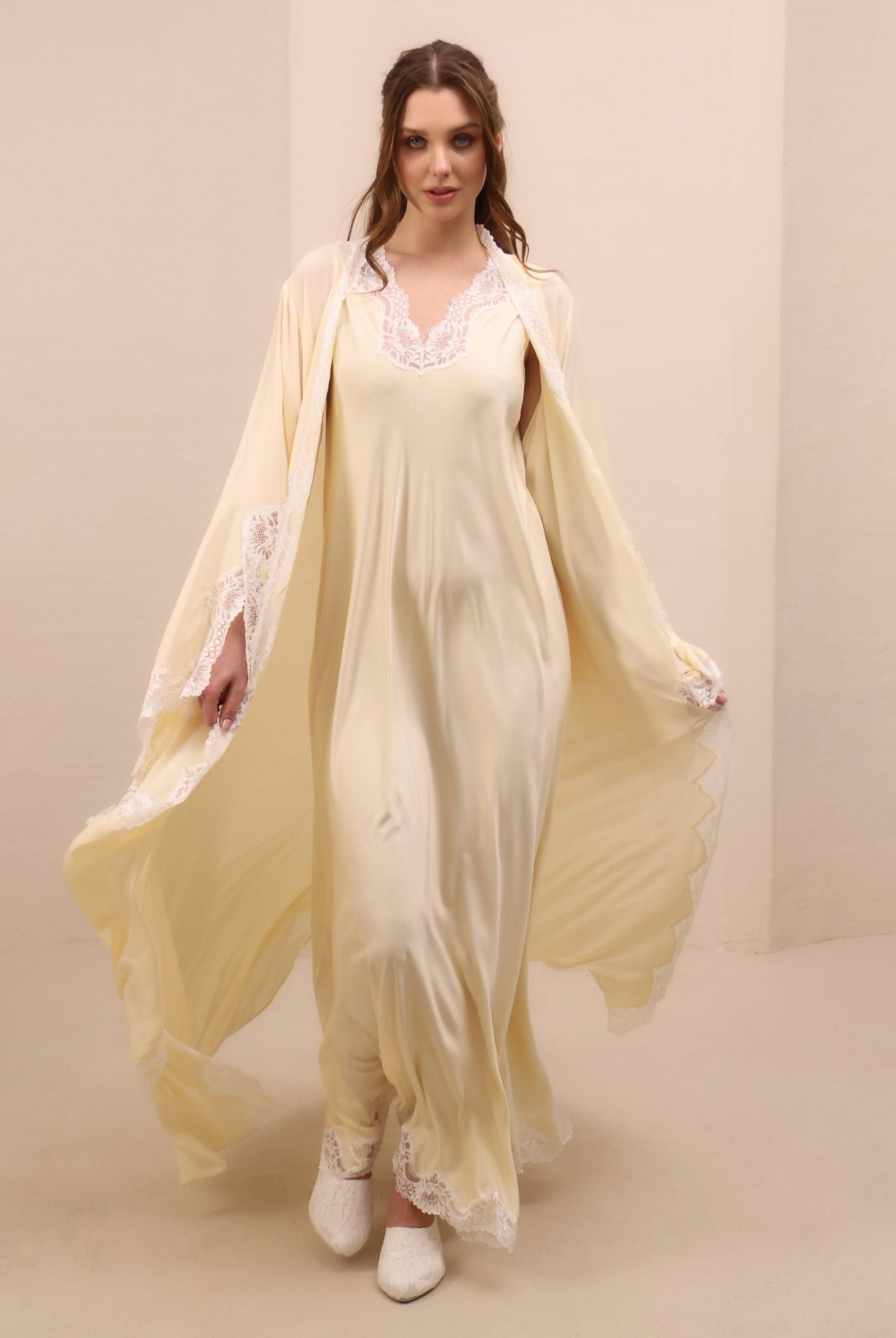 A spirited shot of the Robe and Nightgown Set in motion, highlighting the harmony between sheer textures and lace.