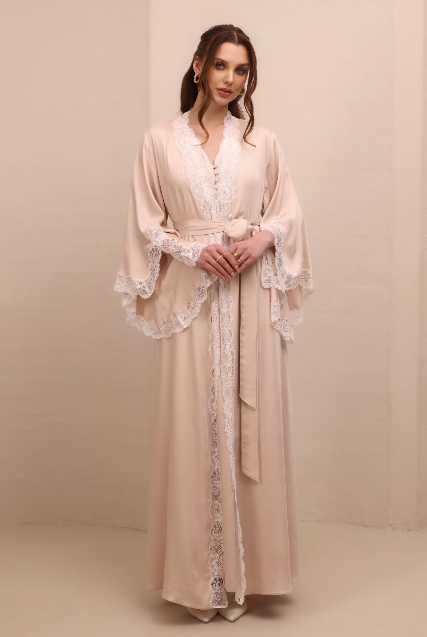 A serene static view of the attire, illustrating the thoughtful feminine design and freedom of movement.