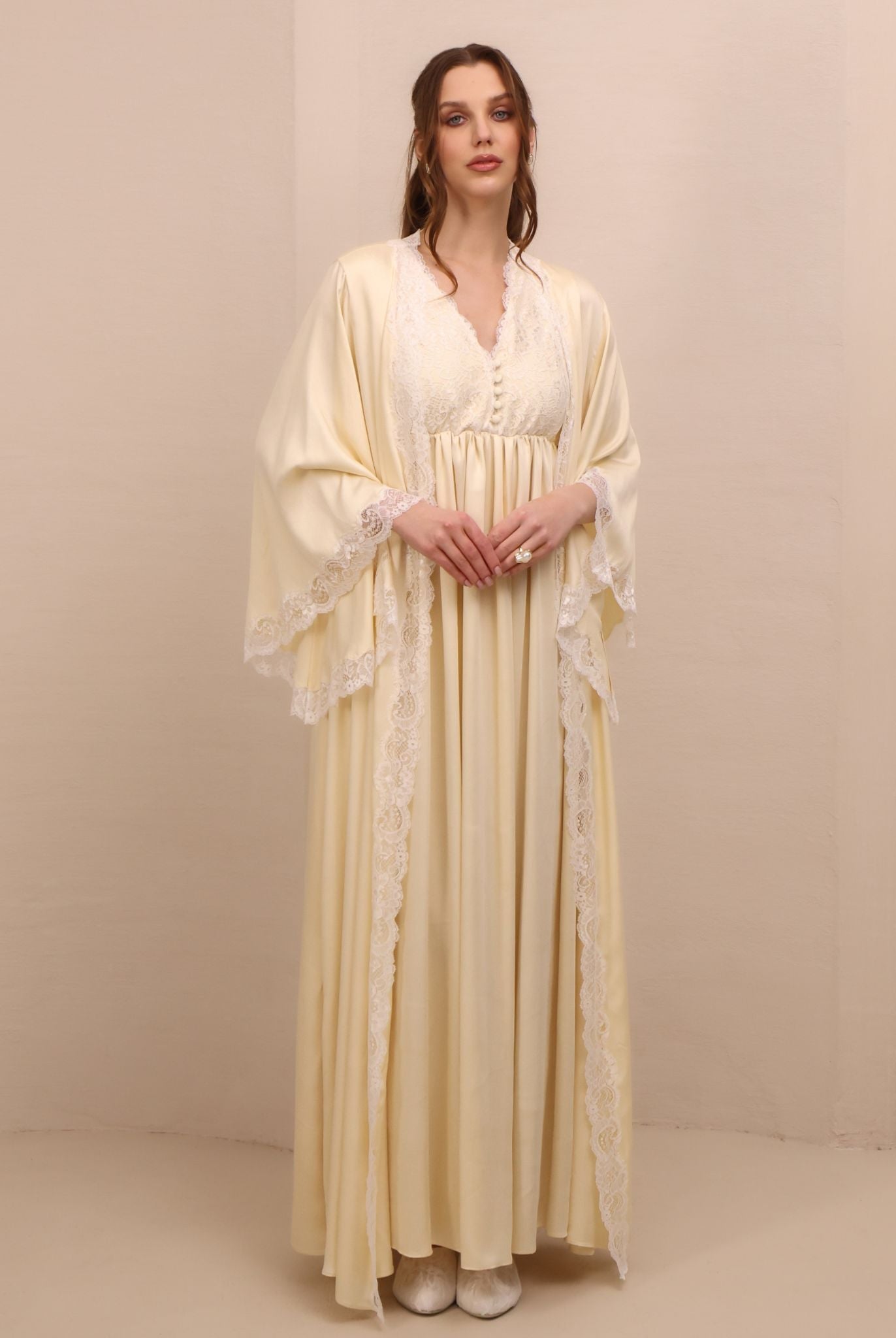 Side perspective of the set, highlighting the delicate lace trim and subtle slits for a touch of elegance.