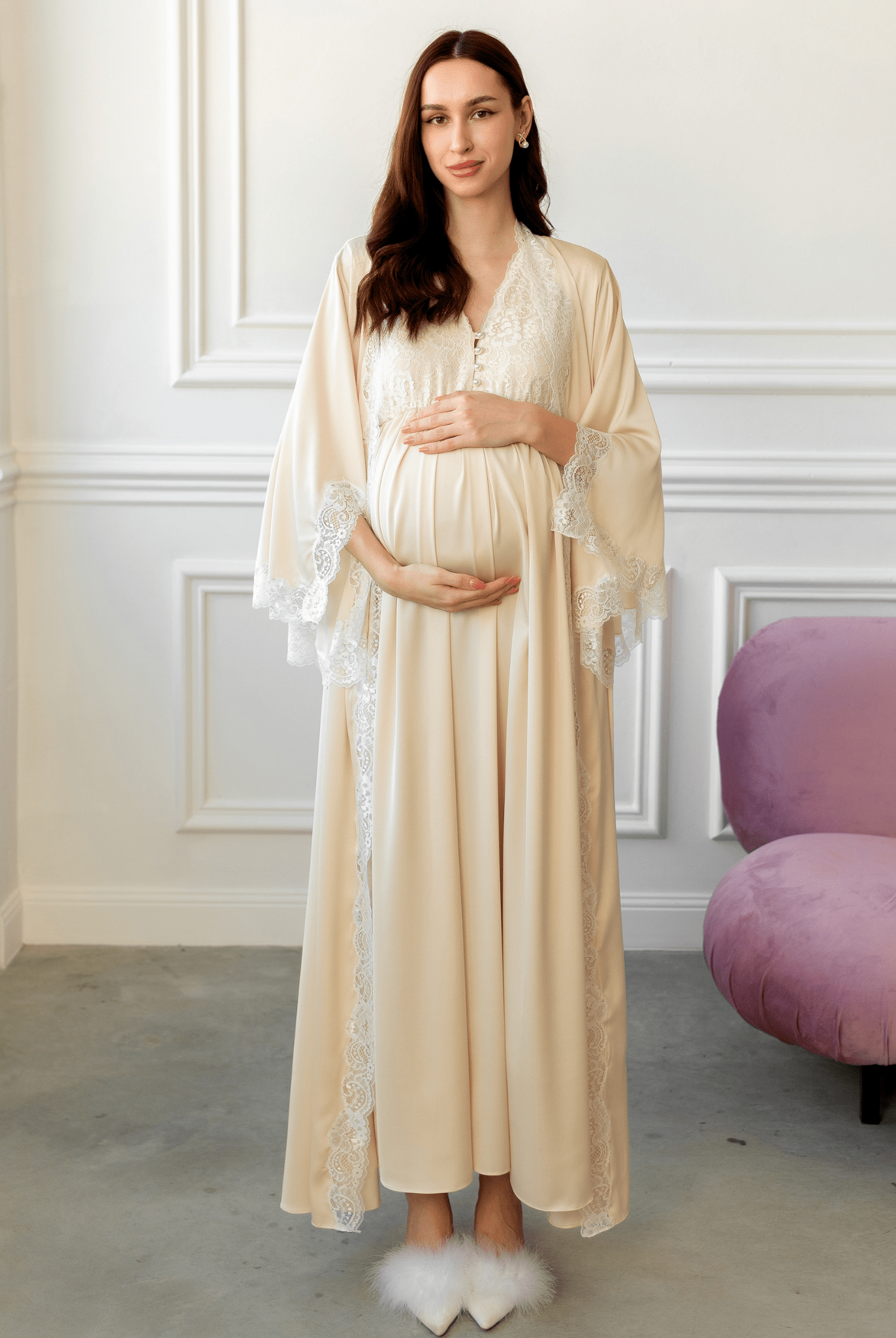 Long vanilla Maternity Robe and Nightgown Set with lace trim, showing hands gently holding a baby bump.