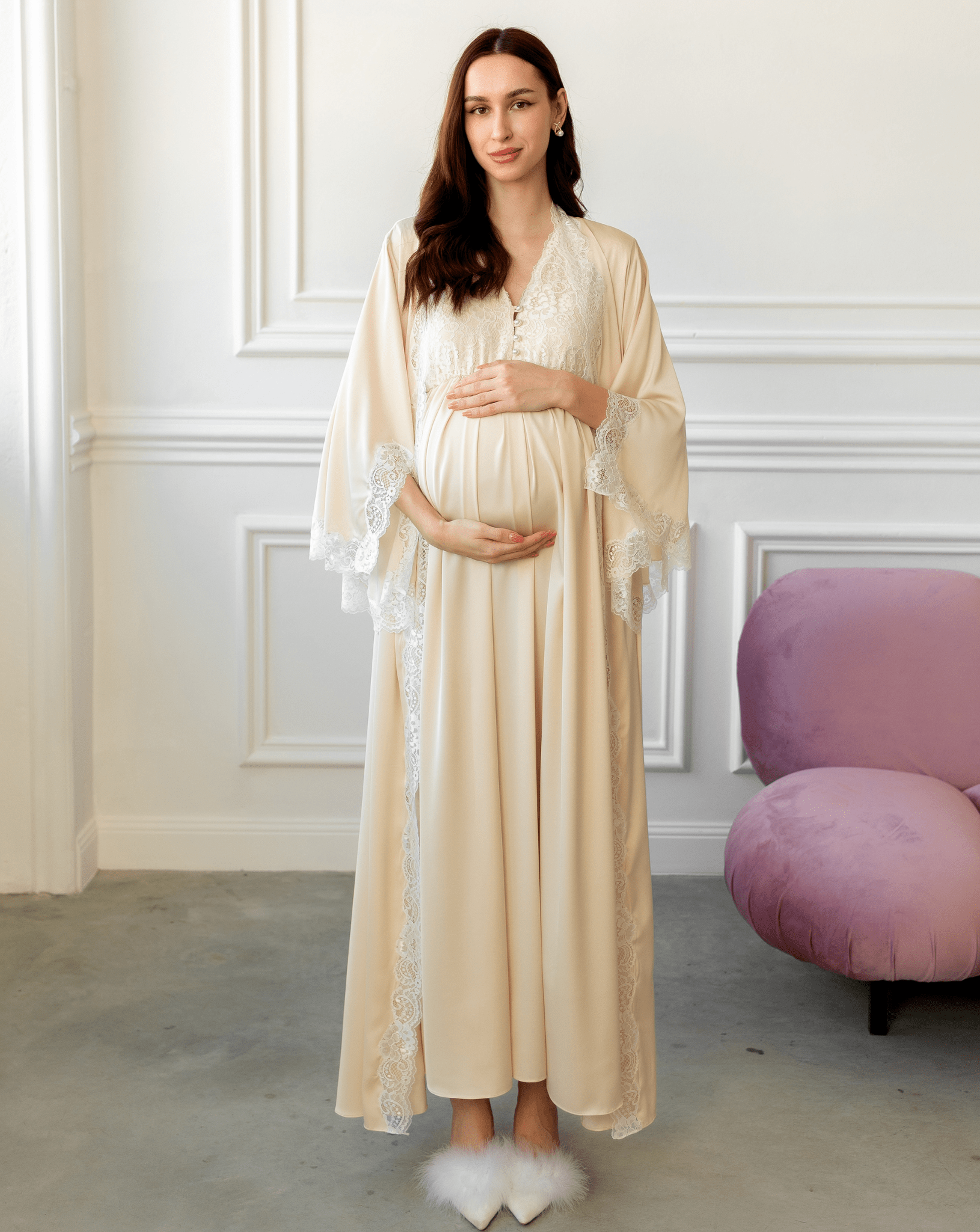 Long vanilla Maternity Robe and Nightgown Set with lace trim, showing hands gently holding a baby bump.