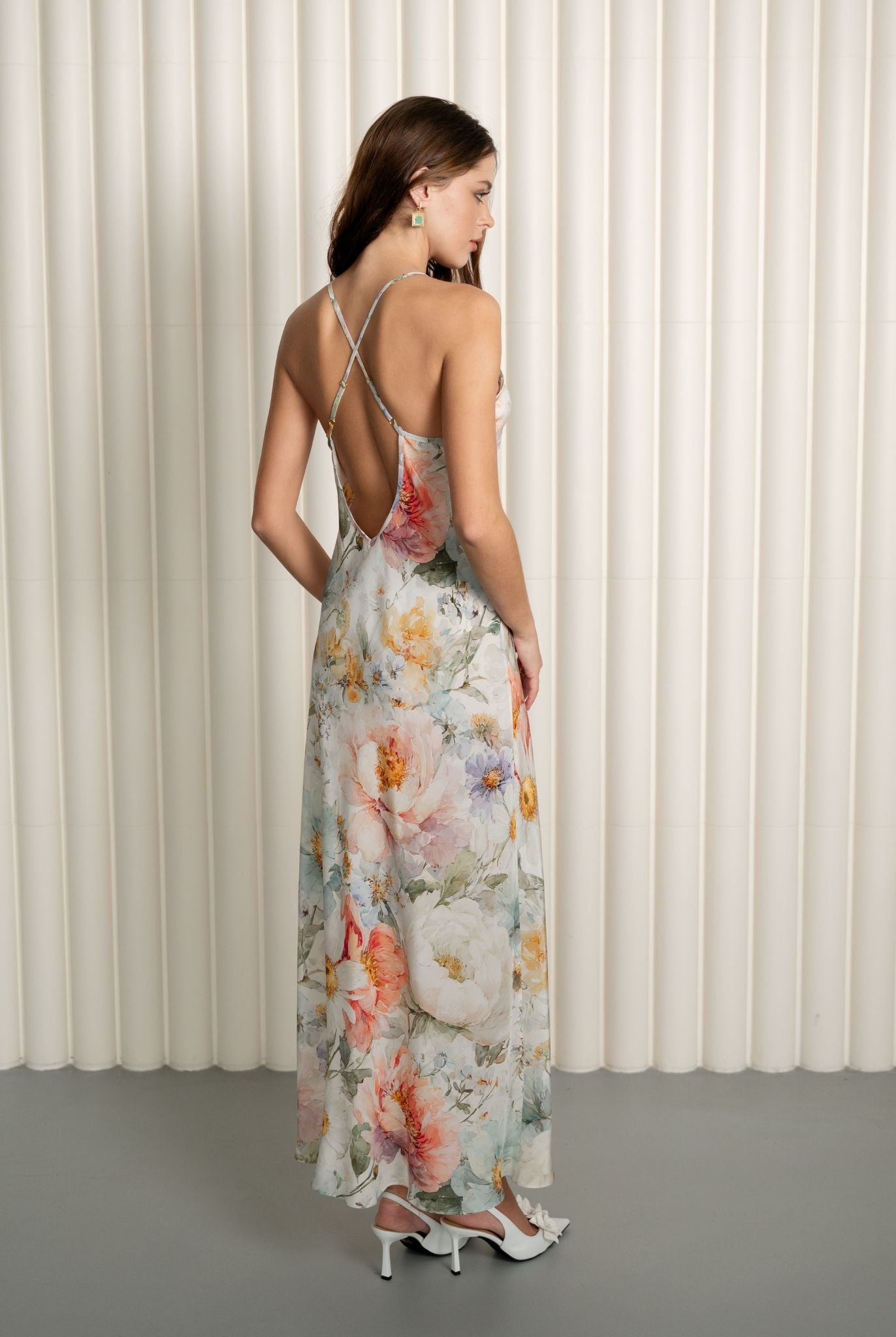 Back view of silk floral nightgown with open criss-cross straps