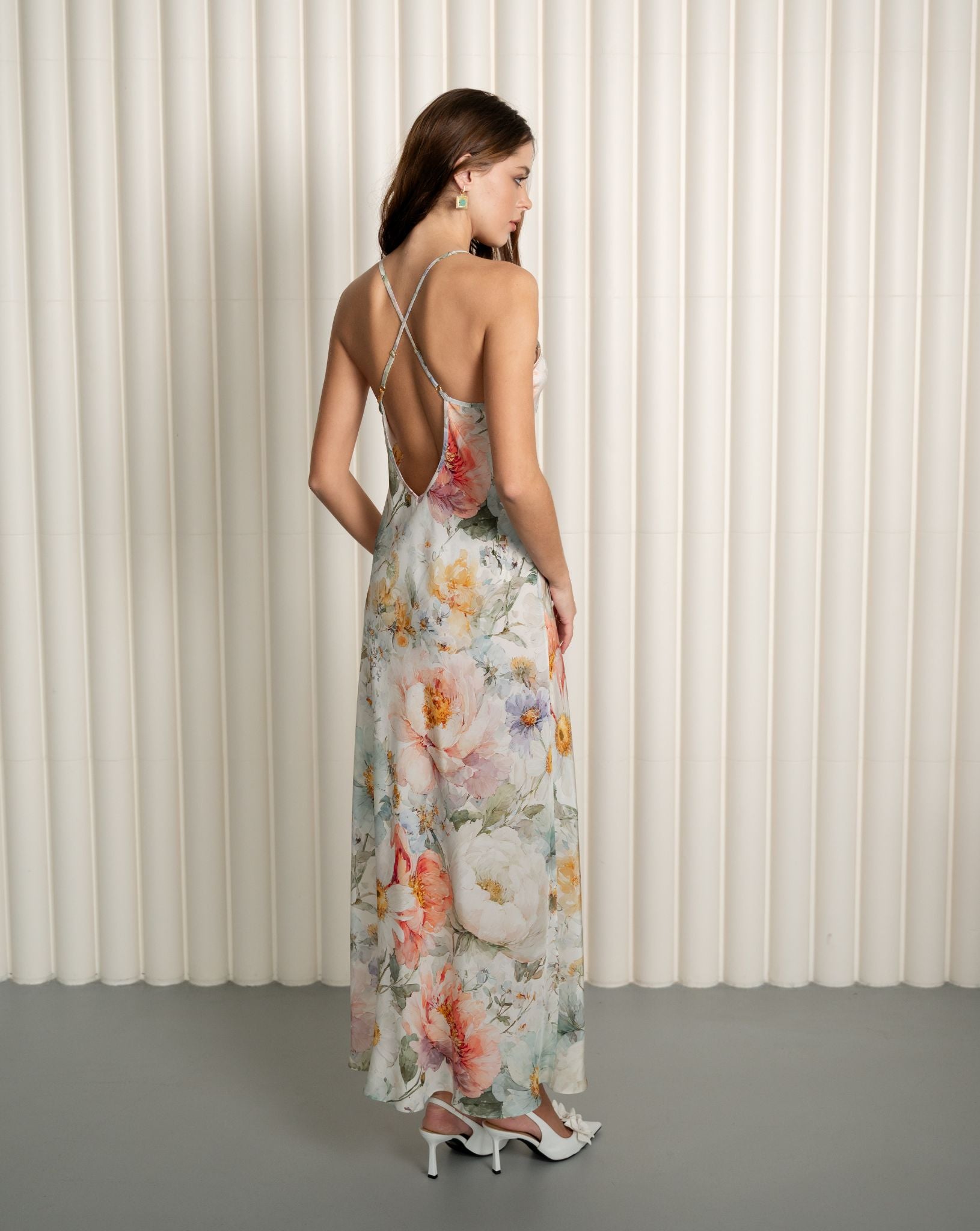 Back view of silk floral nightgown with open criss-cross straps