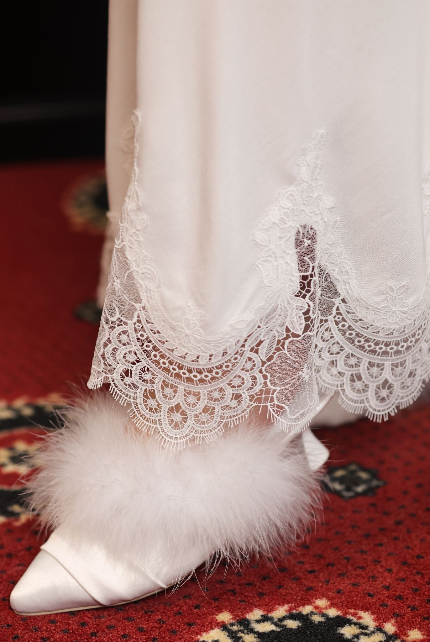 Detailed shot of the lace hem and leg, capturing the fine details and the airy touch of the romantic set.