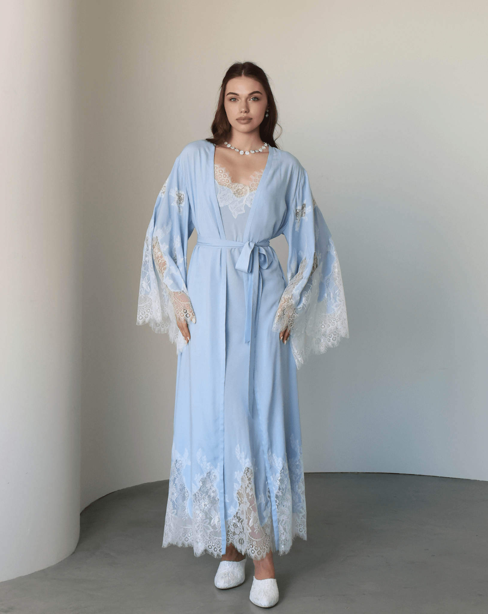 A poised shot of the Robe and Nightgown Set in a wrap-over style, showing a sophisticated look and graceful silhouette.