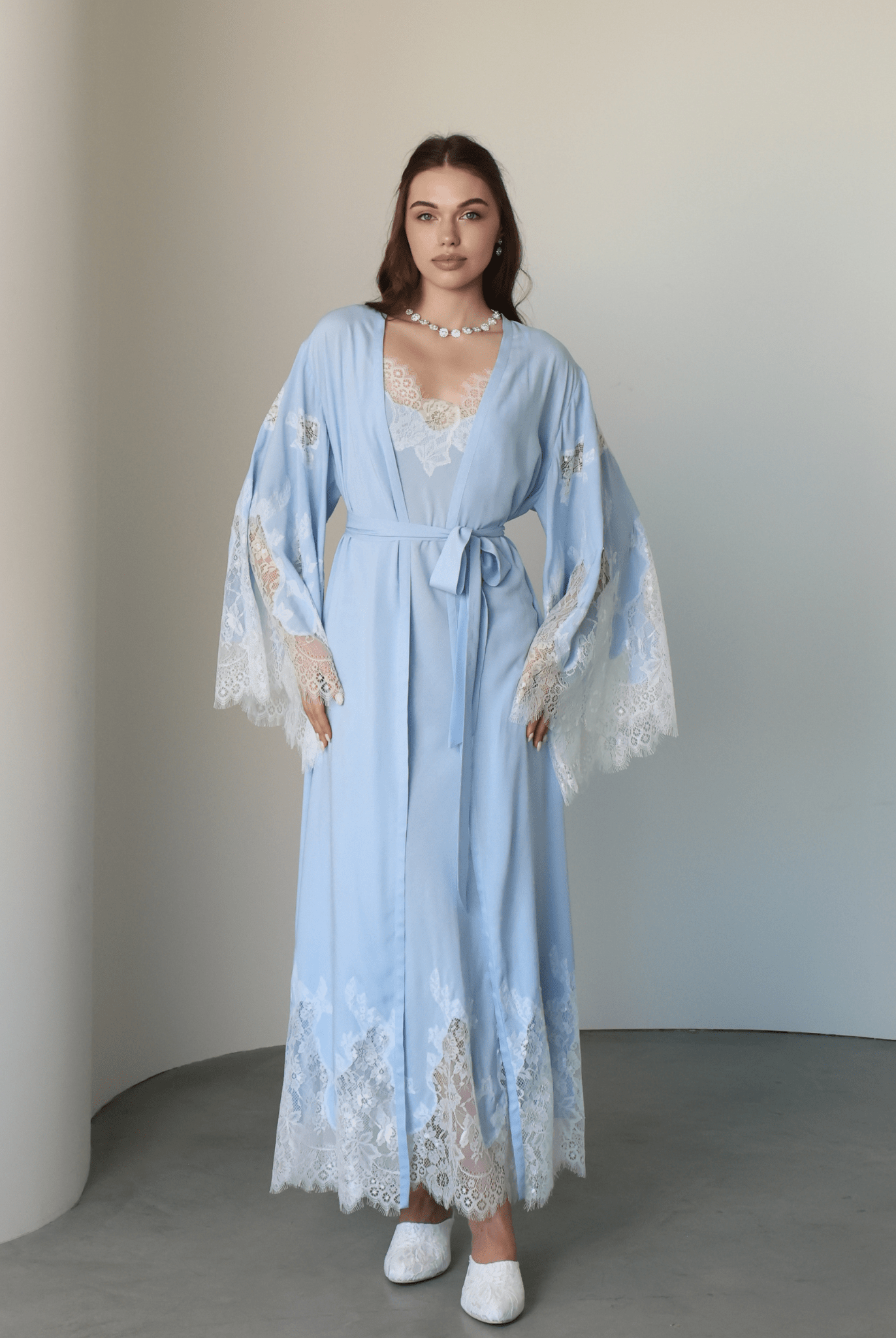 A poised shot of the Robe and Nightgown Set in a wrap-over style, showing a sophisticated look and graceful silhouette.
