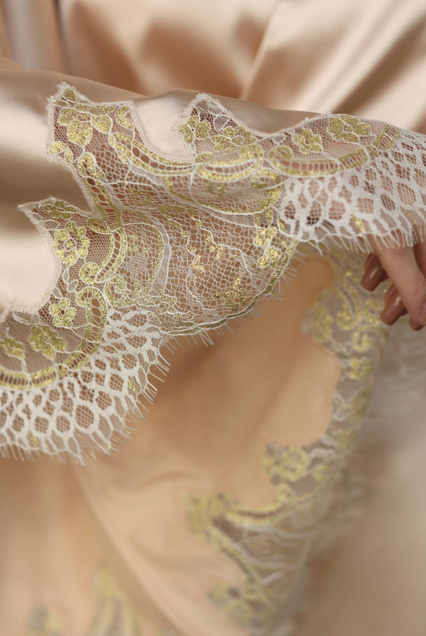 Delicate lace trim on champagne satin robe – close-up of Kafemme craftsmanship