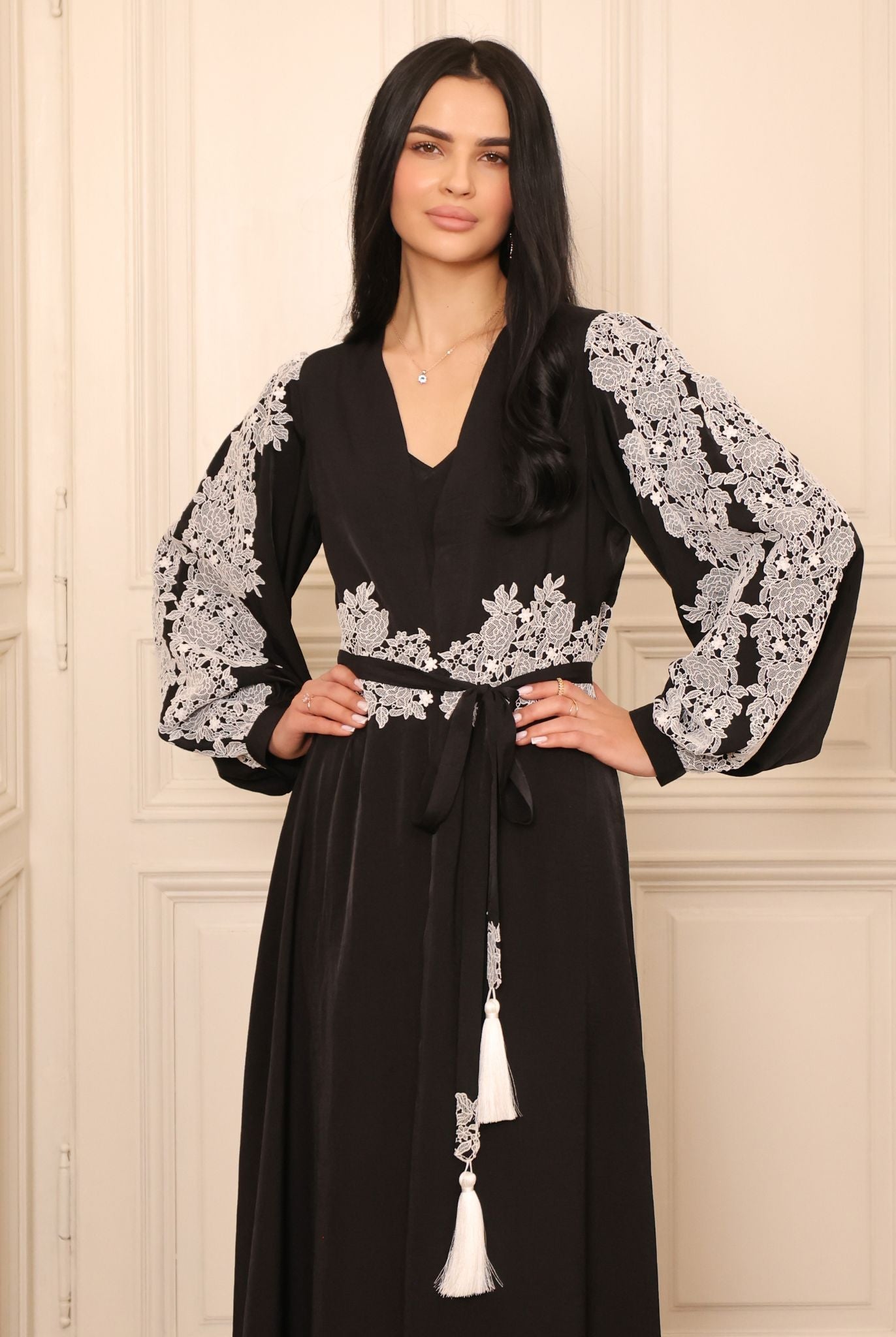 Mid-length view of the ensemble, highlighting the slim tie belt finished with soft tassels for an elegant touch.