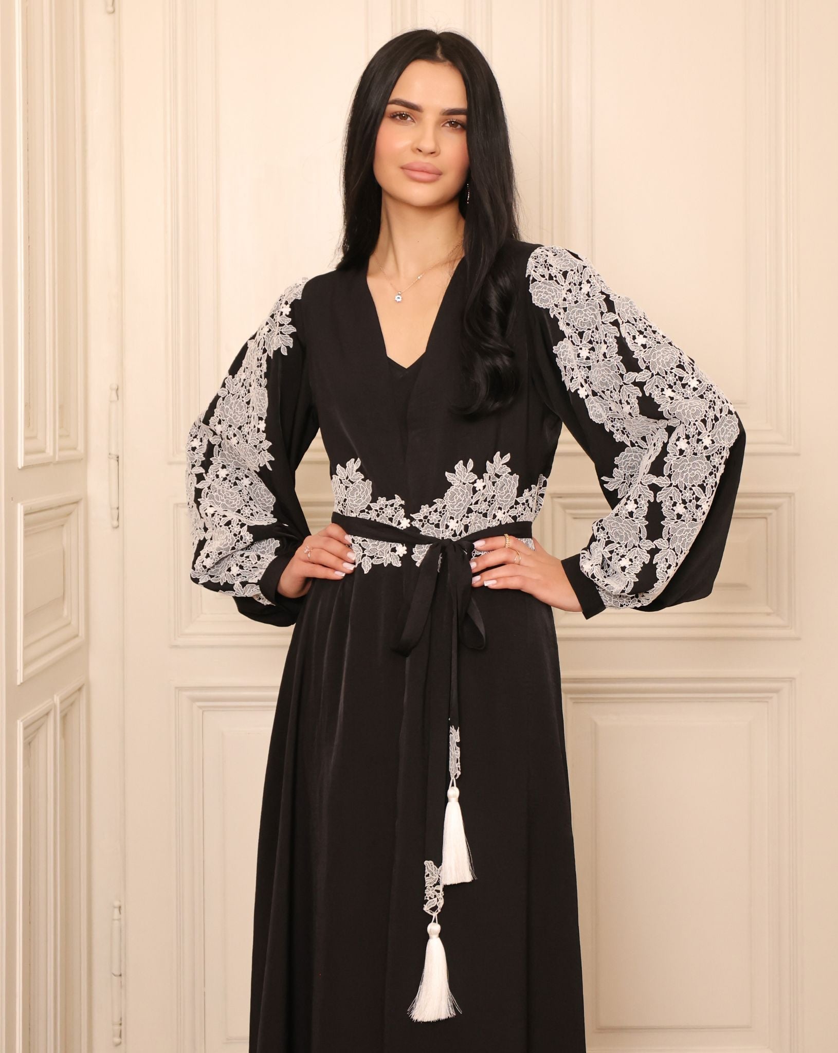 Mid-length view of the ensemble, highlighting the slim tie belt finished with soft tassels for an elegant touch.