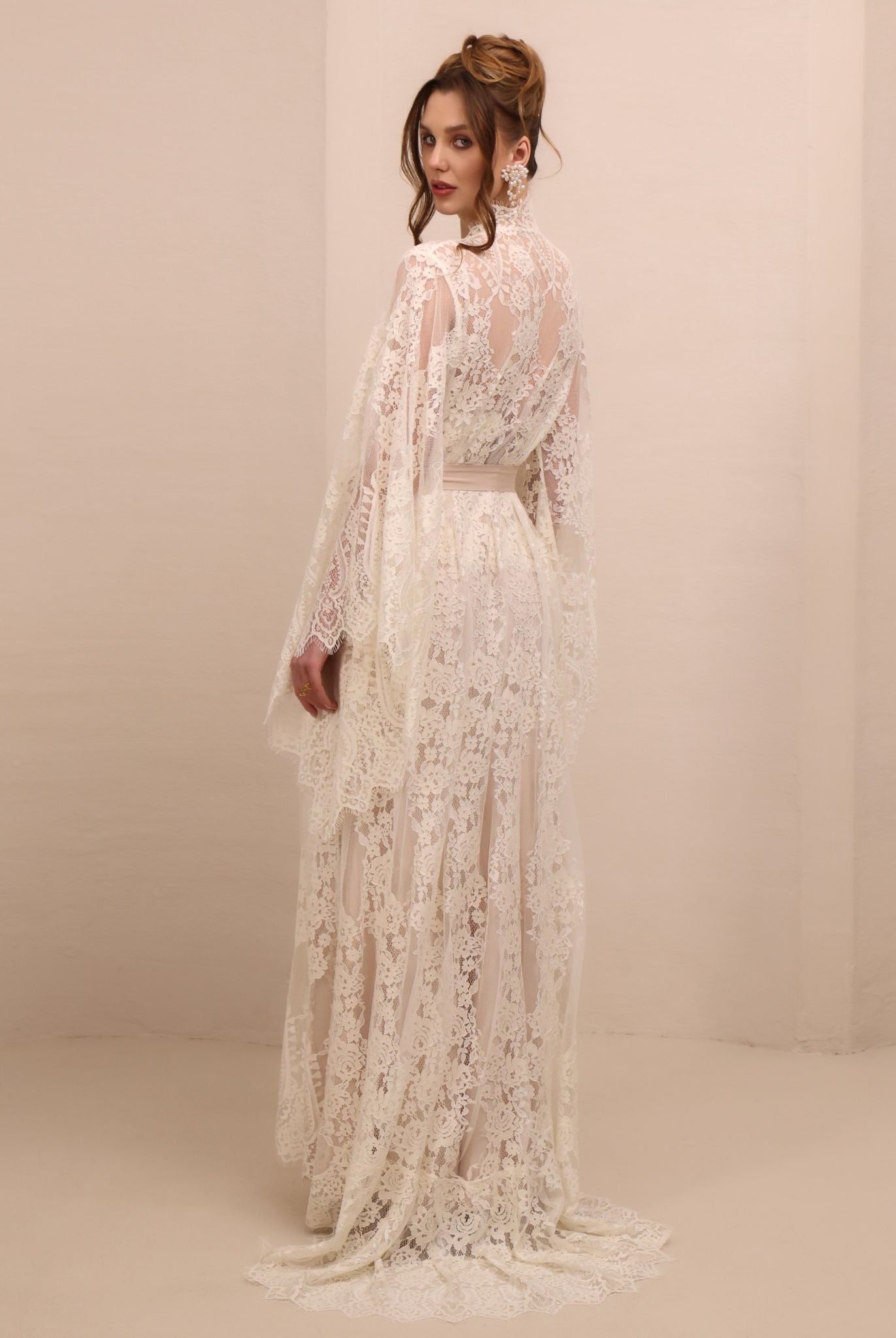 Rear perspective of the full set, showcasing the intricate lace detailing and the elegant length of the train.