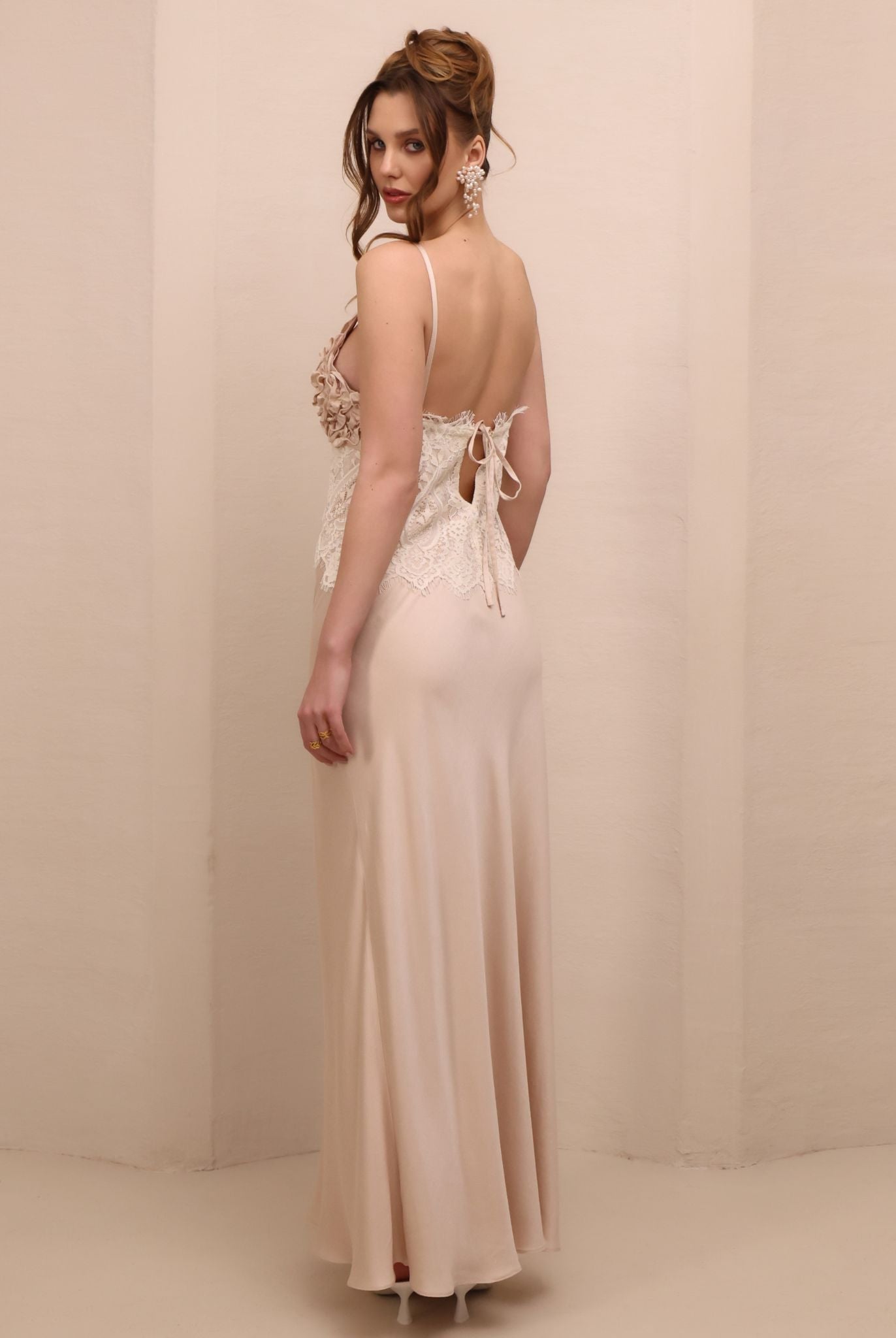 Rear view of the nightdress, highlighting the elegant tie detail and the graceful open-back effect.