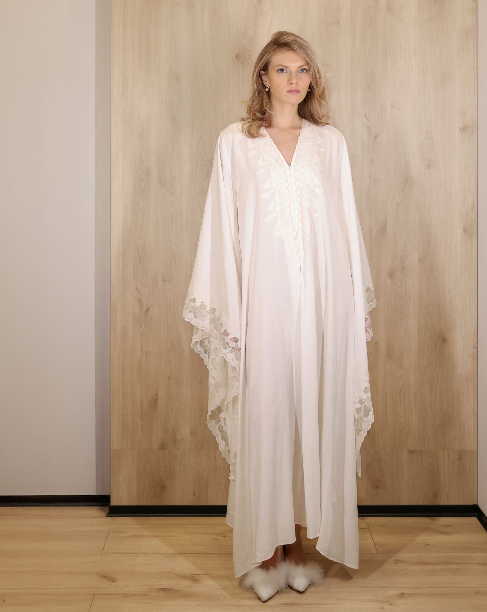 Rear view showing the full kaftan silhouette