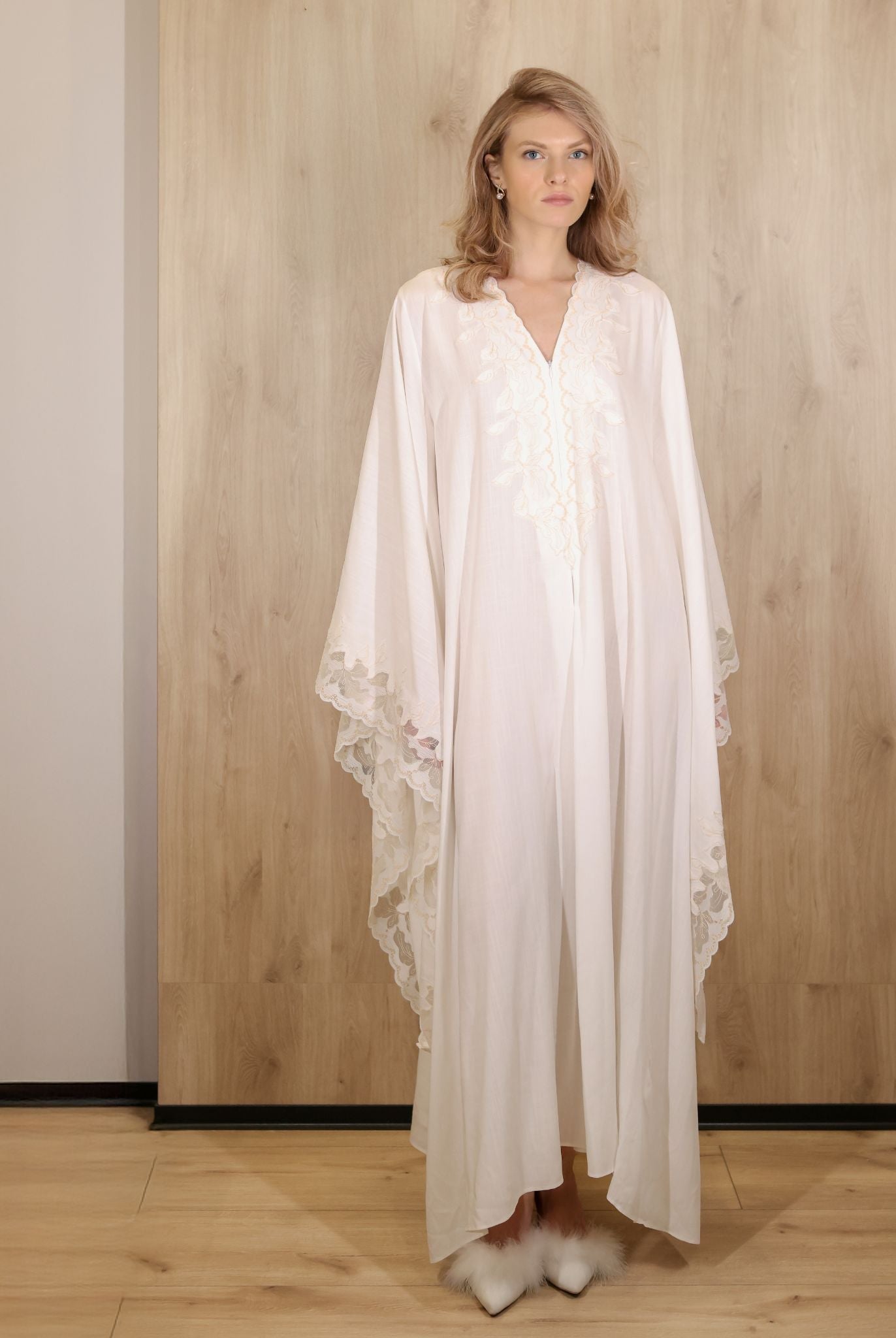 Full-length shot of the Cotton Kaftan without a belt, emphasizing the loose fit and freedom of movement.