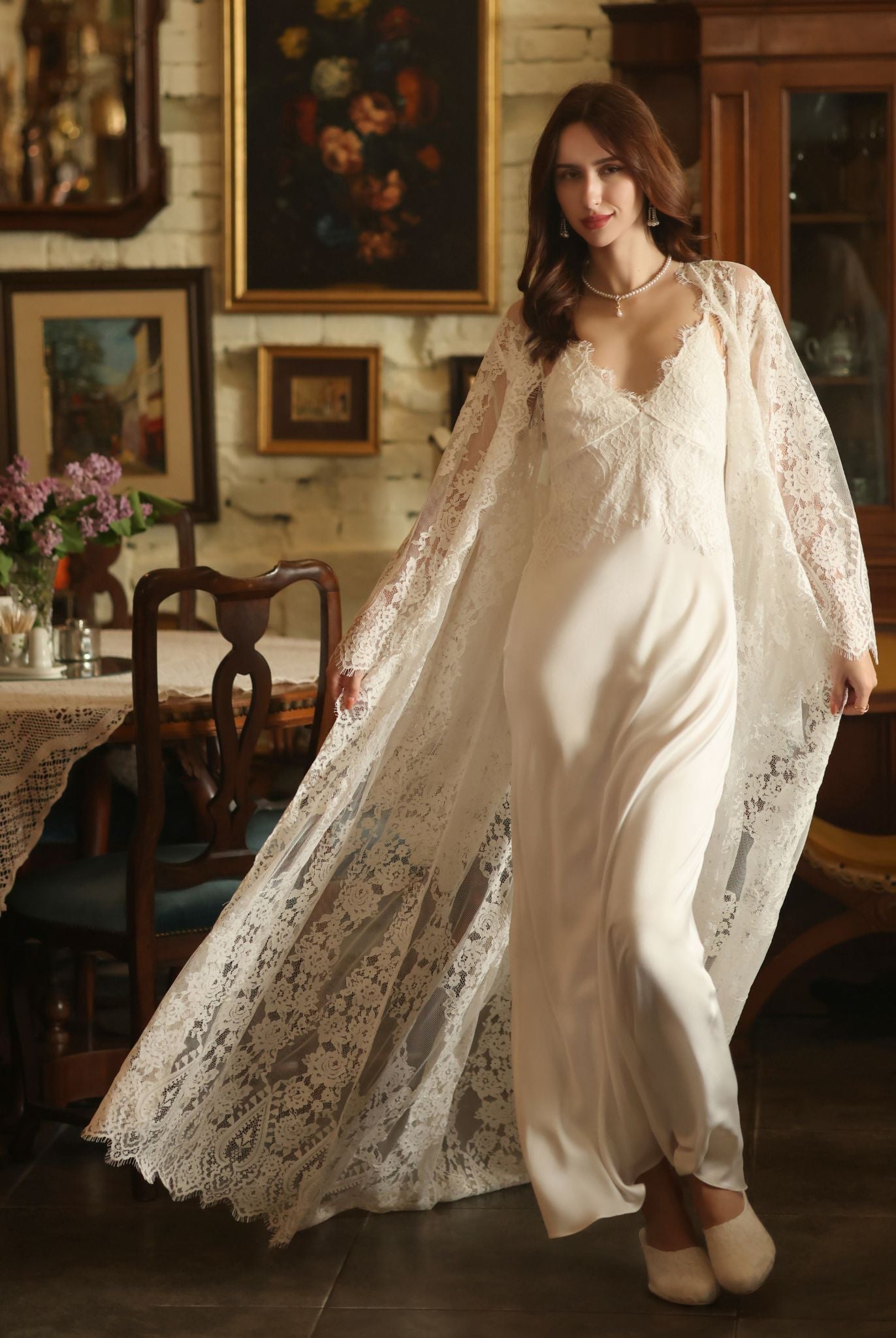 A dynamic motion shot of the Bridal Robe and Nightgown Set, capturing the fluid movement of the fabric and back train.
