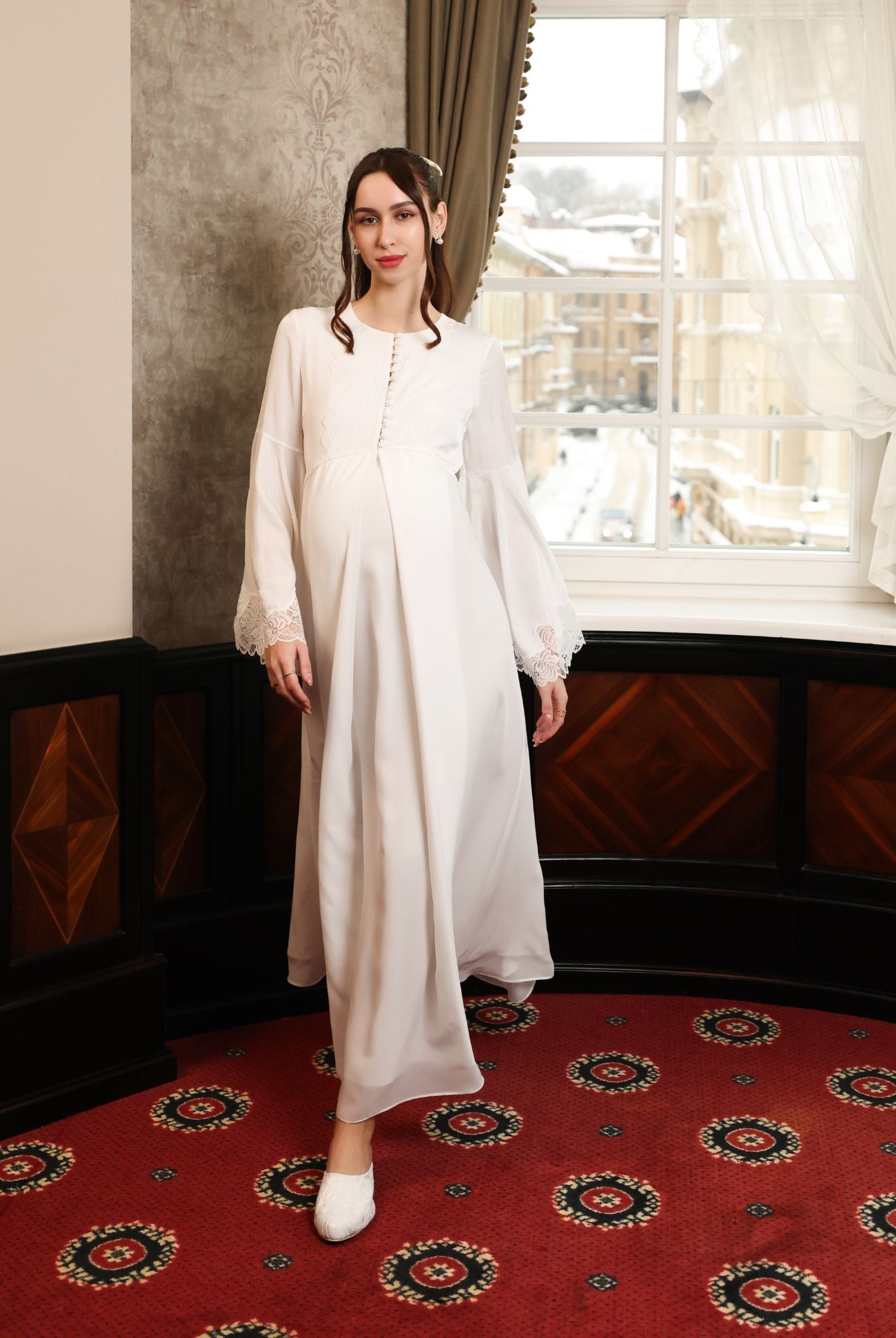 A dynamic view of the Modest Lounge Dress in motion, illustrating the fluid and weightless feel of the fabric.