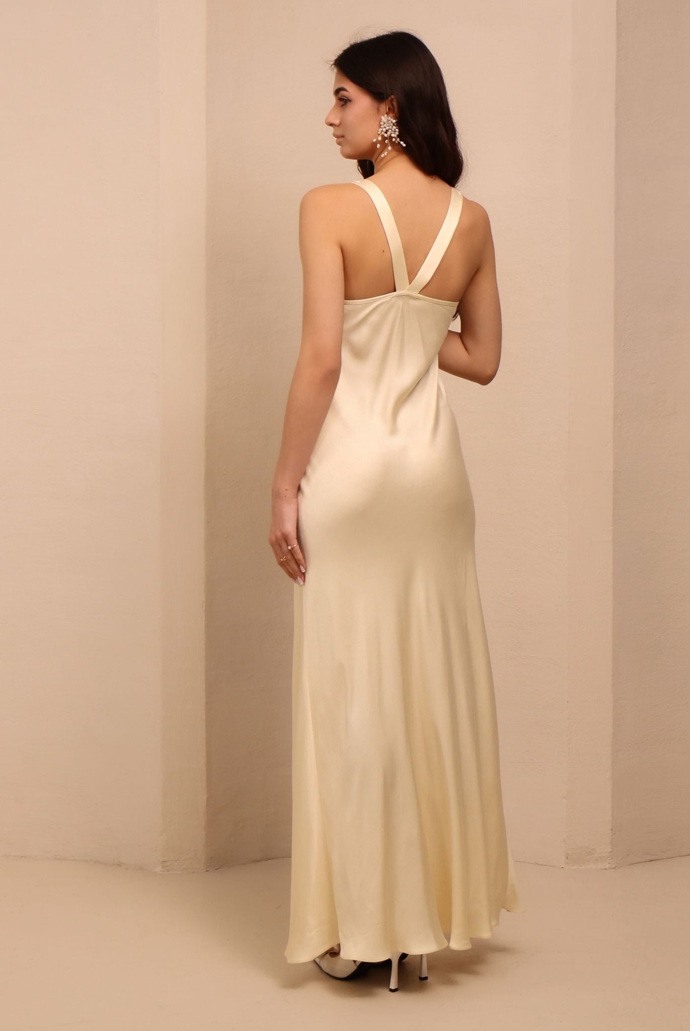 Rear view of the nightdress, highlighting the mid-open back and the natural movement of the lightweight material.