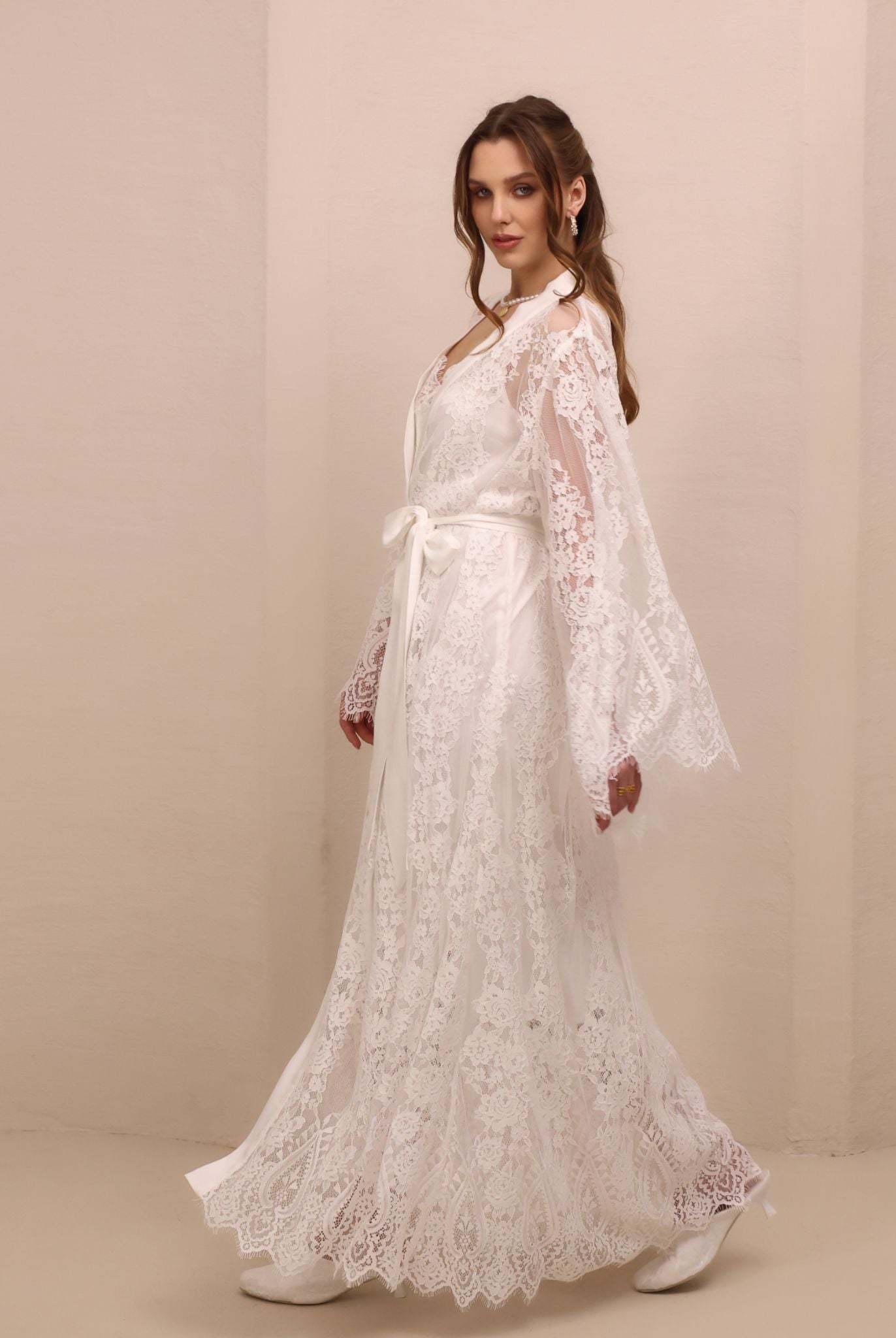 A dynamic view of the Robe and Nightgown Set, capturing the elegant movement of the lace-adorned fabric.