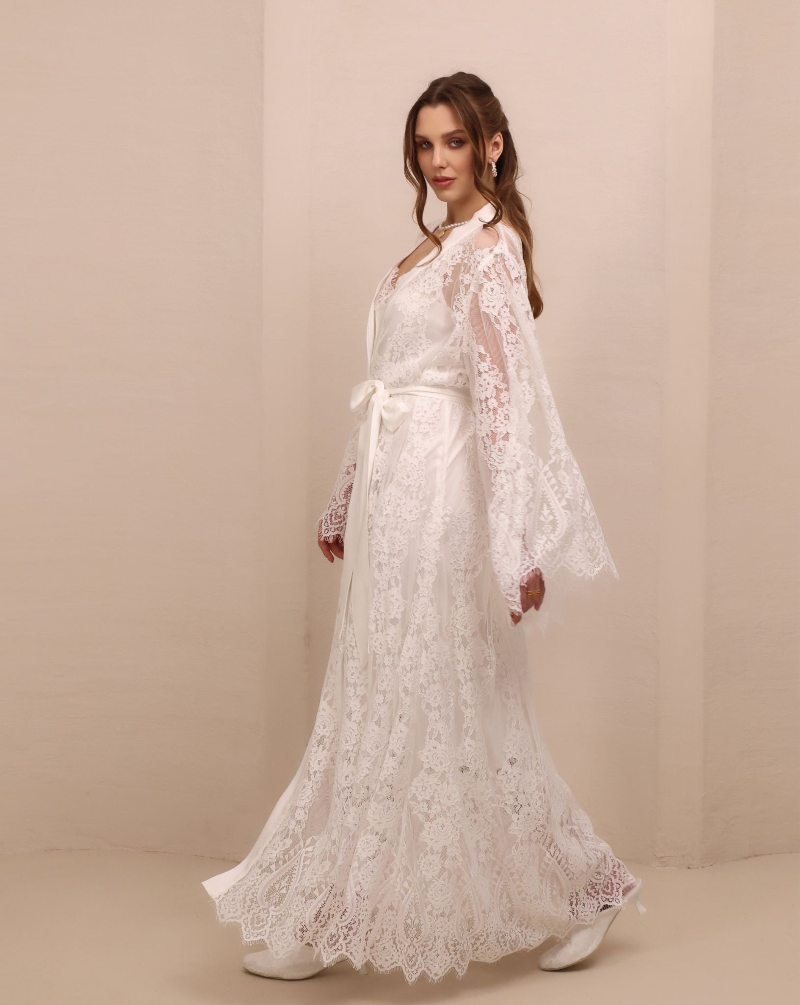 A dynamic view of the Robe and Nightgown Set, capturing the elegant movement of the lace-adorned fabric.