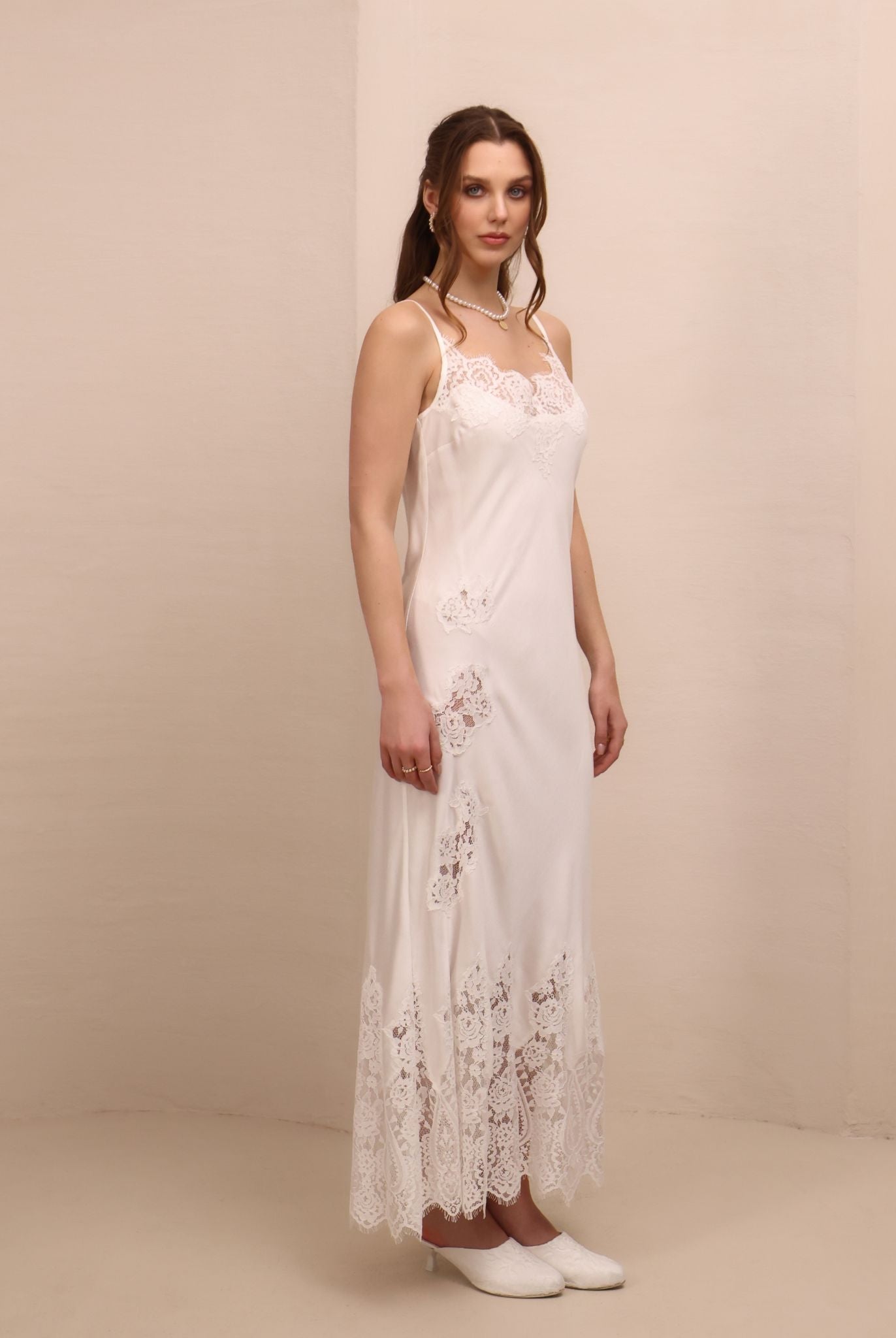 Side perspective of the nightdress, illustrating the graceful drape of the cotton-viscose blend on the body.