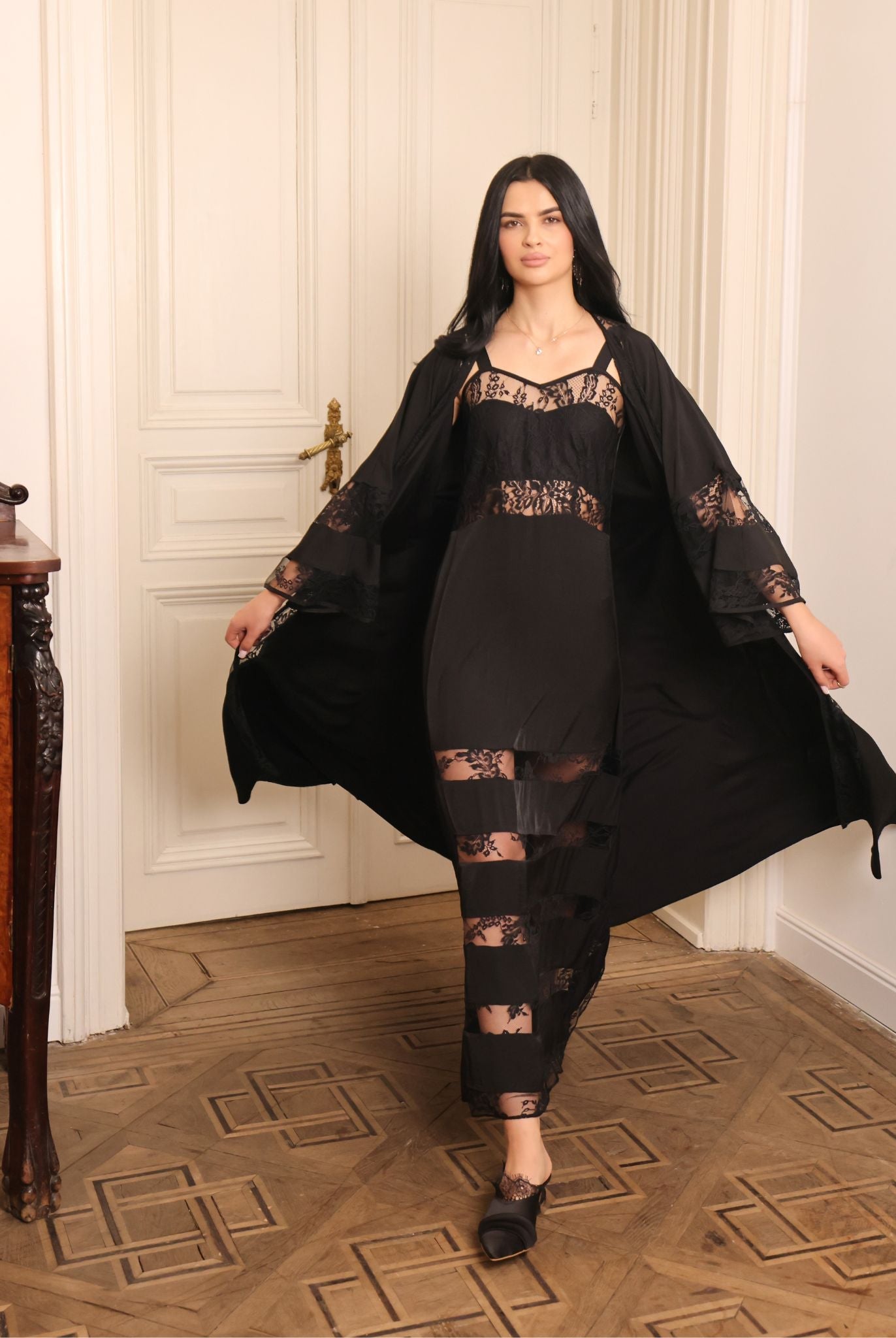 Rear motion shot of the flowing robe, illustrating the breathable 100% viscose fabric and its natural sheen.